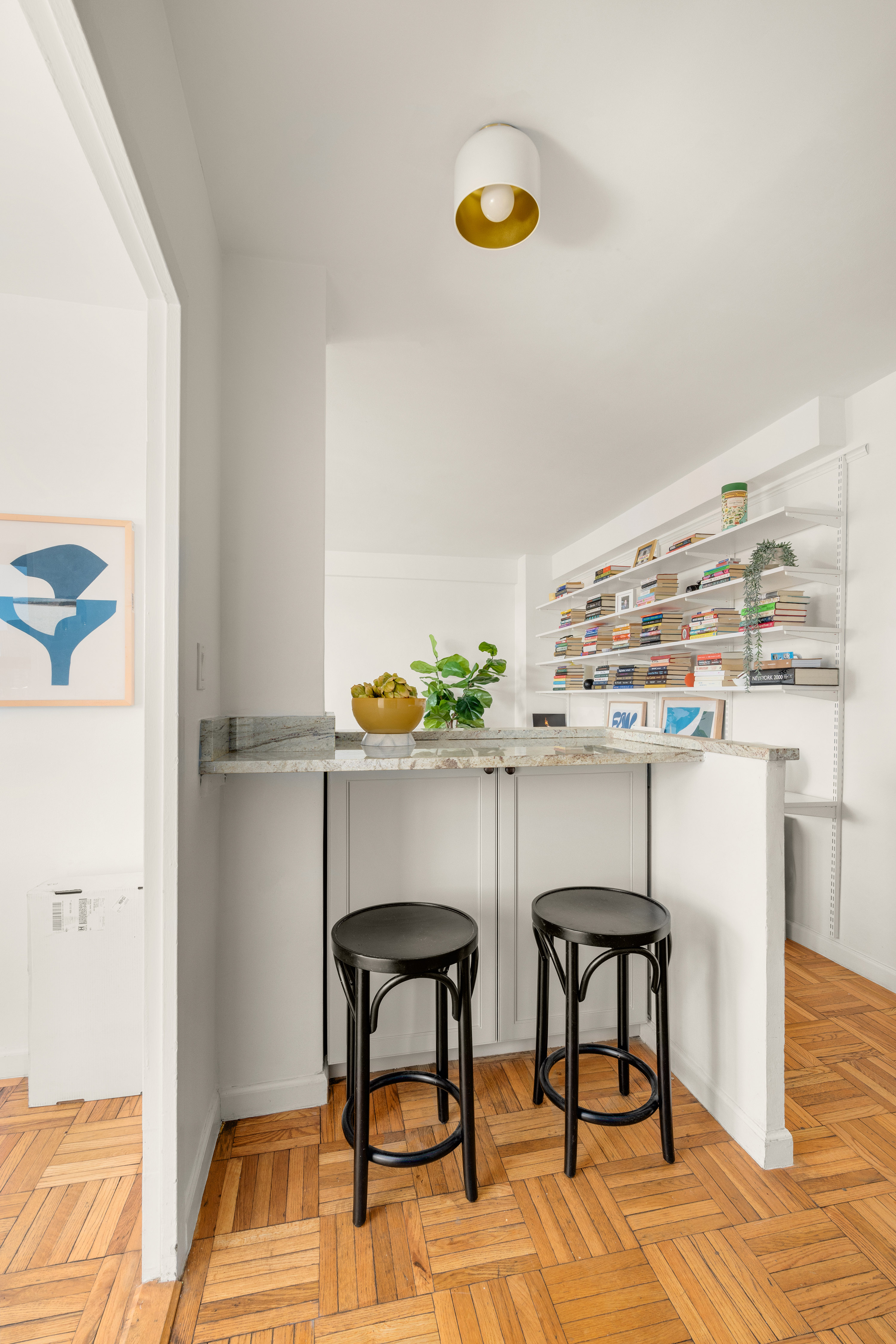361 Clinton Avenue, Unit 7D Brooklyn, NY 11238 - Photo 4 of 10 a view of a kitchen with dining table and chairs