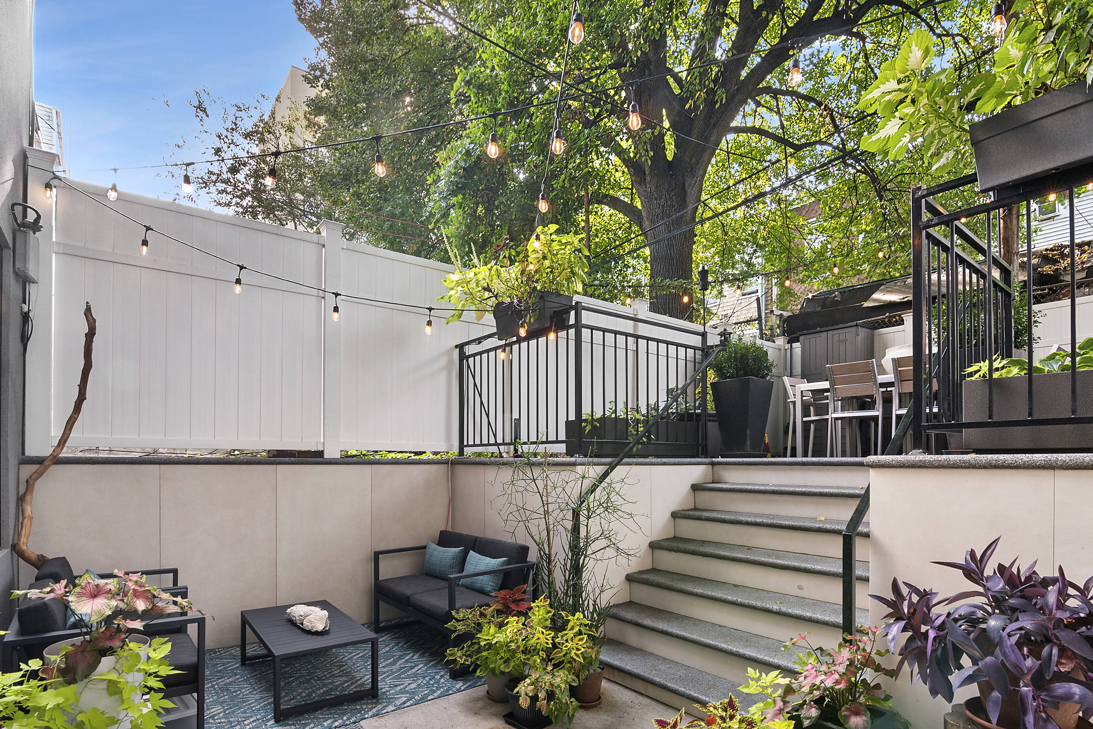1043 Halsey Street, Unit 1 Brooklyn, NY 11207 - Photo 2 of 14 a view of a terrace with couches