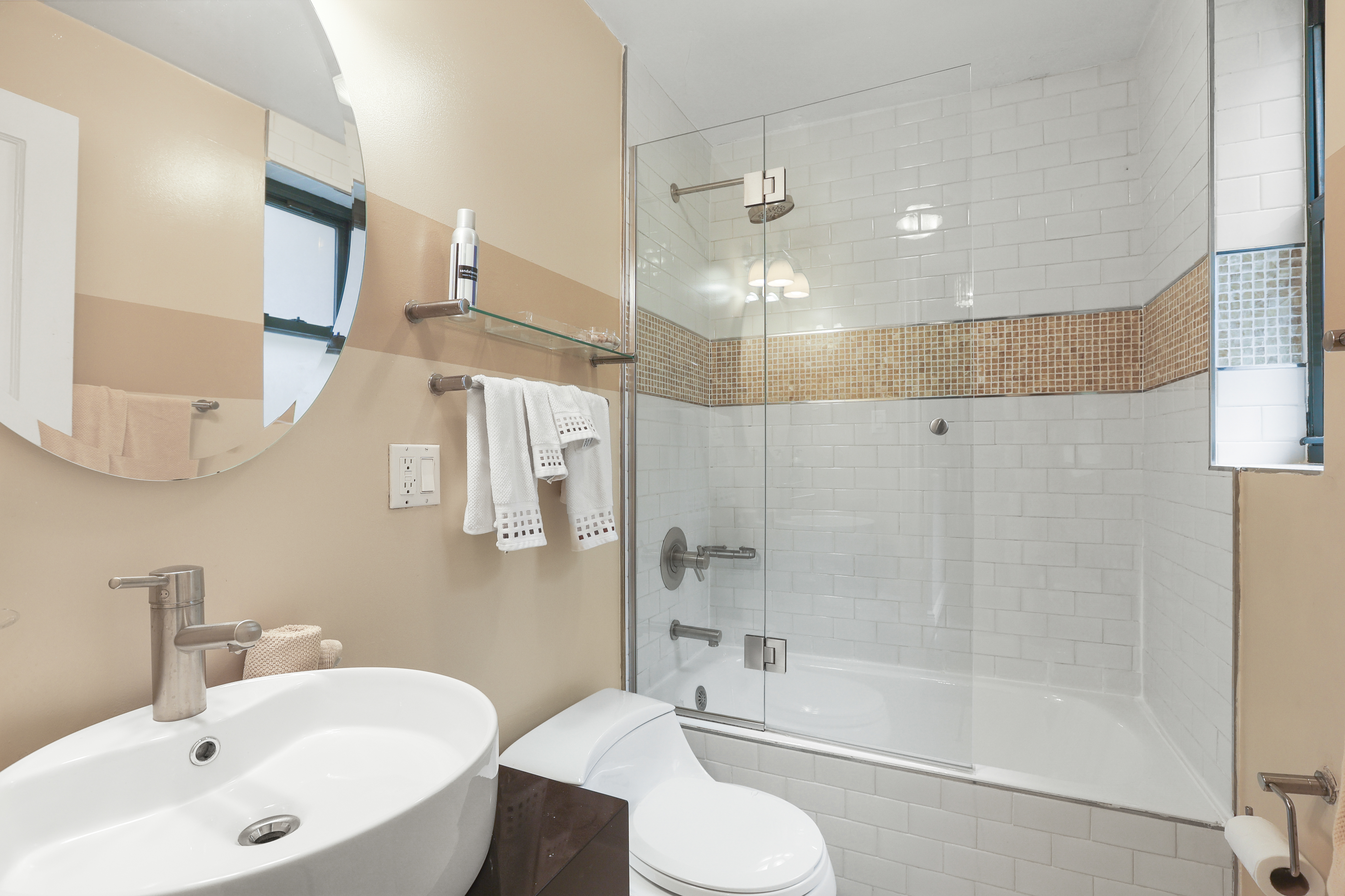 65 West 95th Street, Unit 7G Manhattan, NY 10025 - Photo 8 of 9 a bathroom with a sink toilet and shower