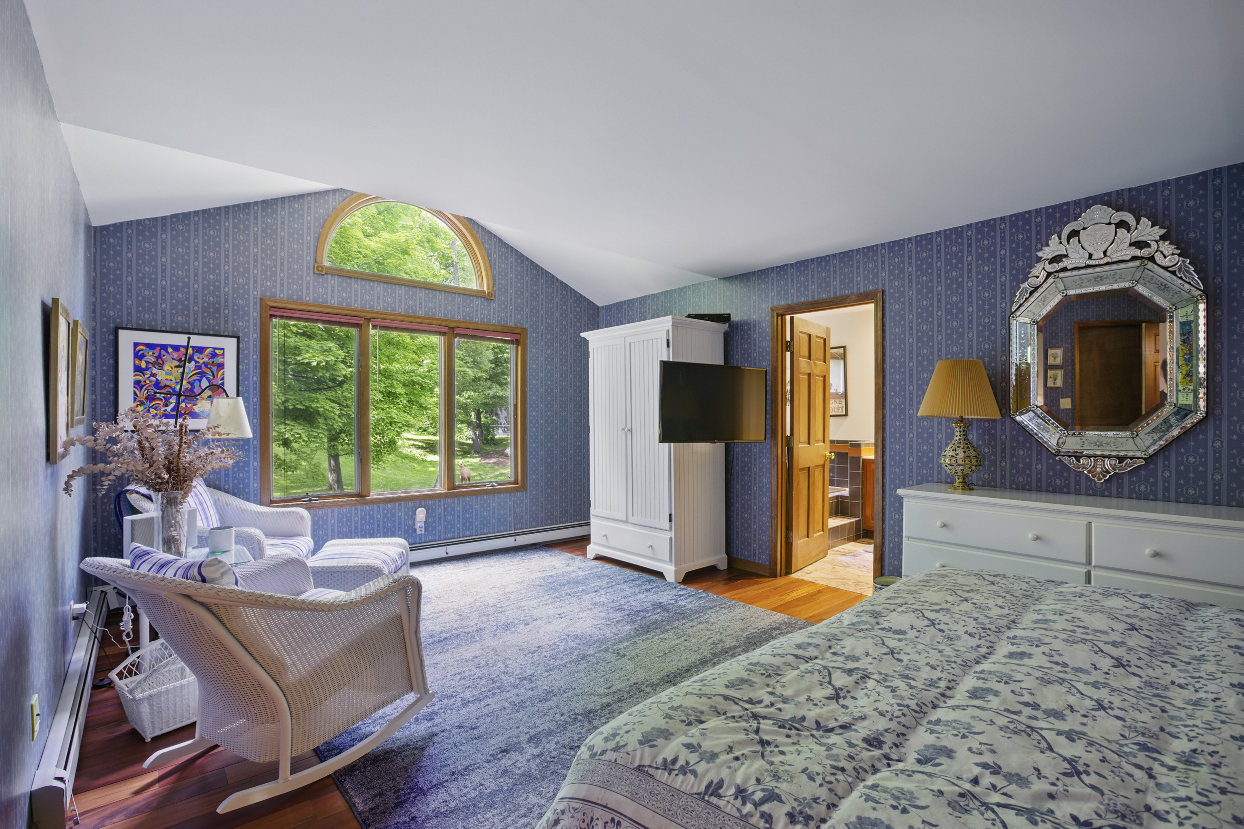 19 Pond Road Cold Spring, NY 10516 - Photo 16 of 32 a living room with furniture and a flat screen tv