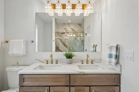 a bathroom with a sink and a mirror