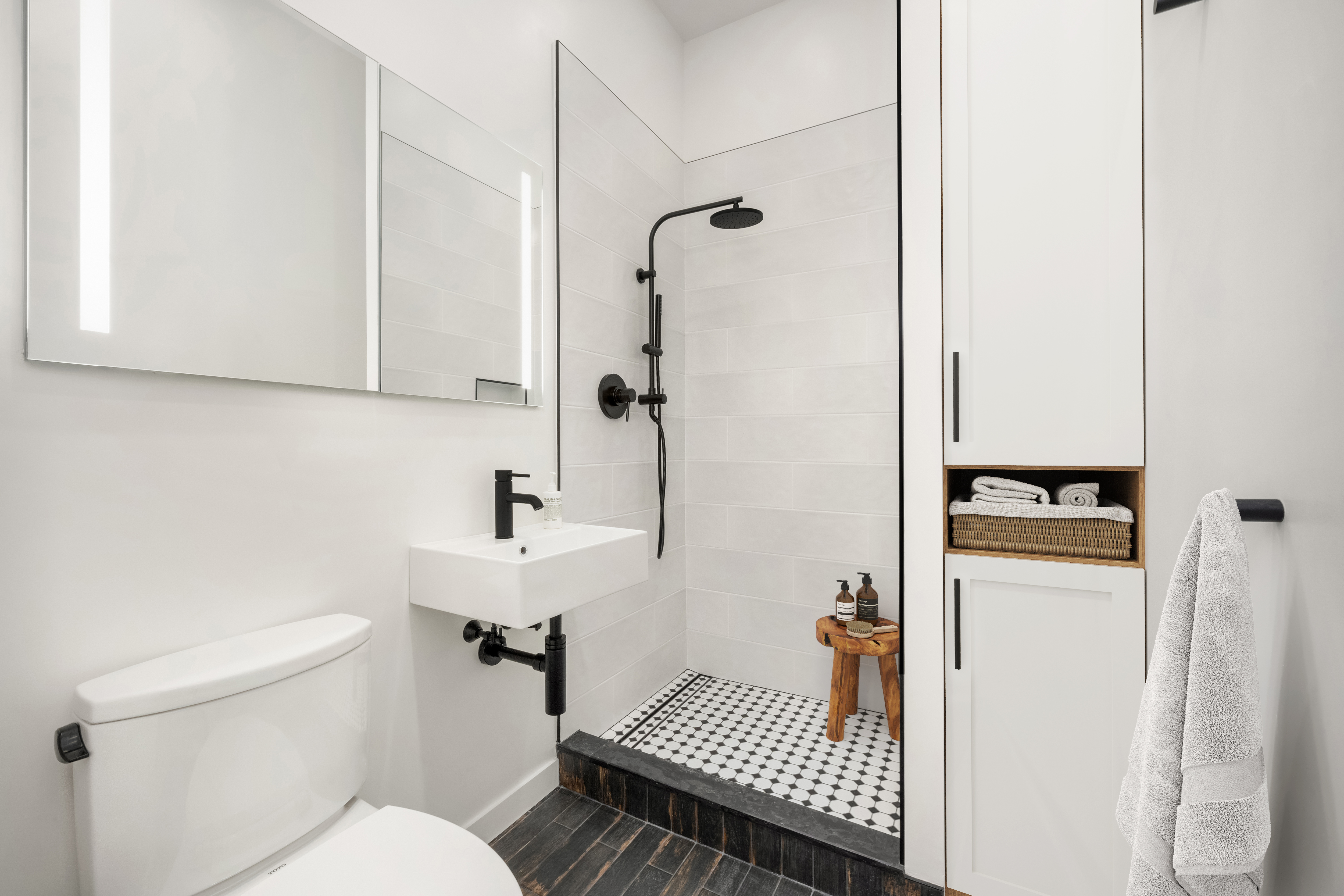 23 East 10th Street, Unit 3F Manhattan, NY 10003 - Photo 9 of 18 a bathroom with a sink toilet and shower