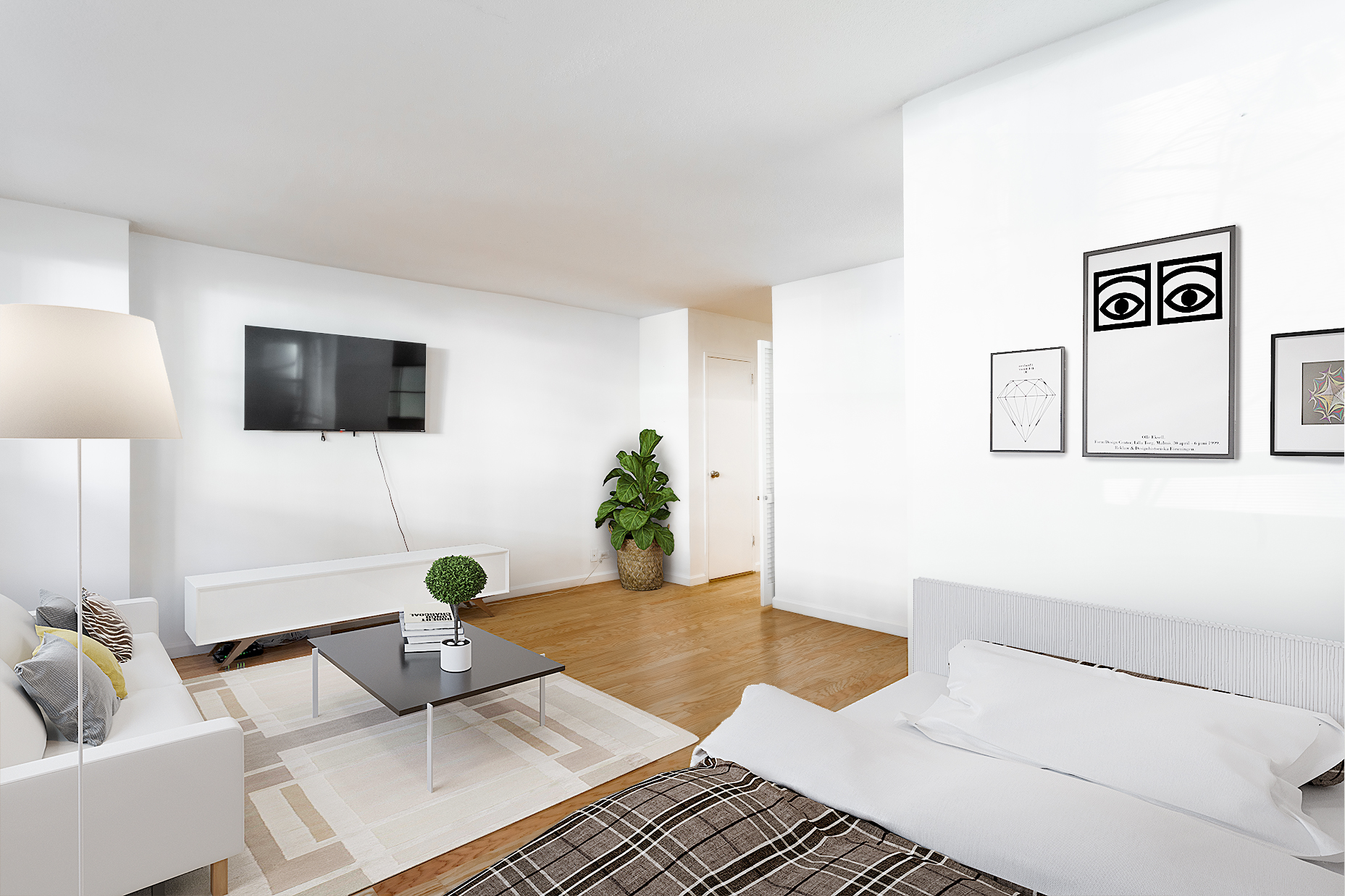 520 East 81st Street, Unit 1F Manhattan, NY 10028 - Photo 2 of 8 a living room with furniture and a flat screen tv