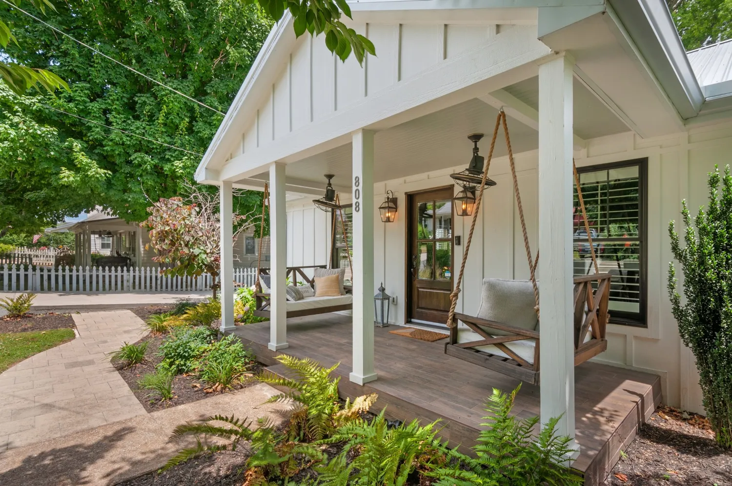 a view of a chair and tables in the balcony