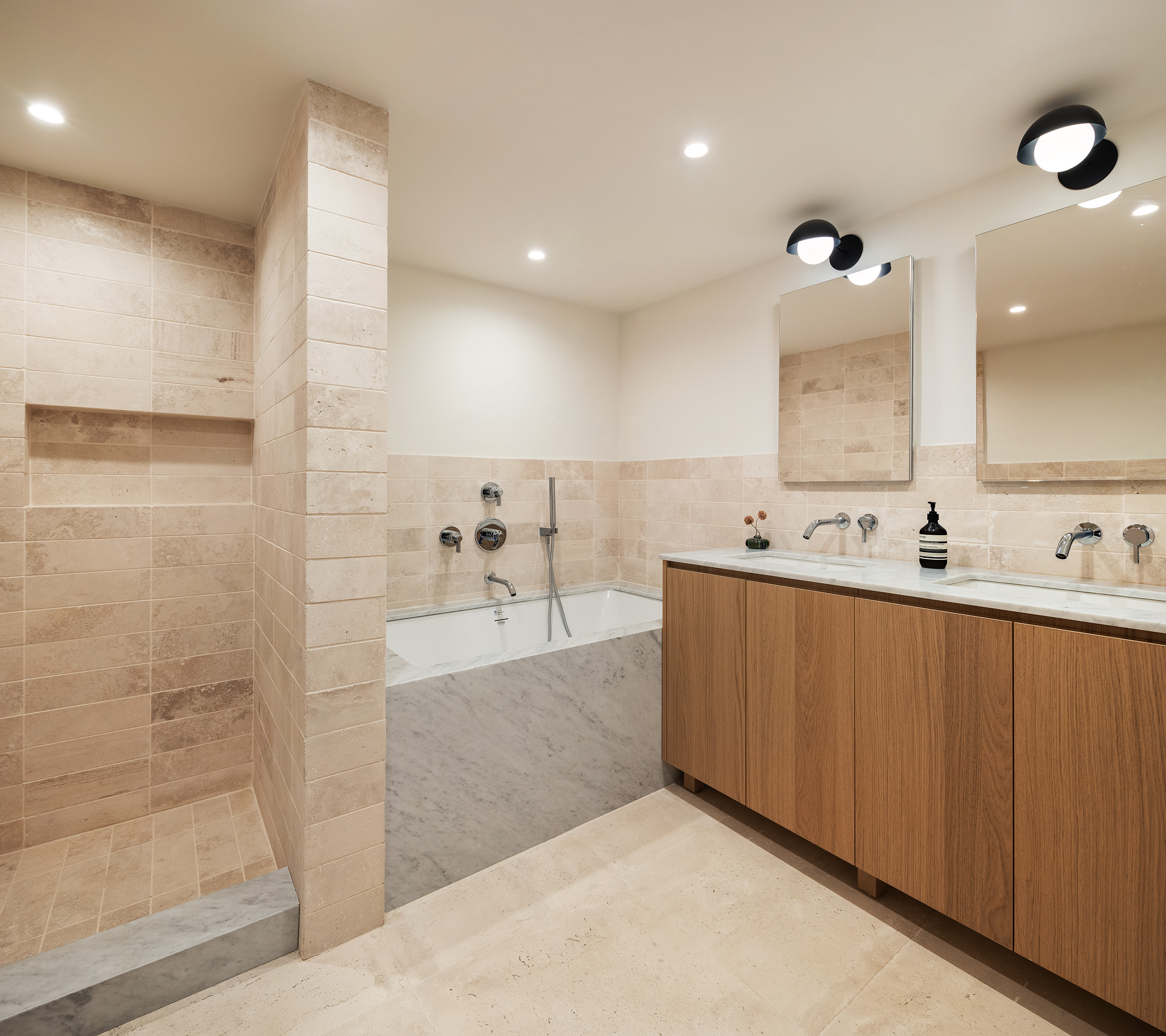 238 Degraw Street, Unit 1 Brooklyn, NY 11231 - Photo 7 of 13 a bathroom with a bathtub sink and mirror