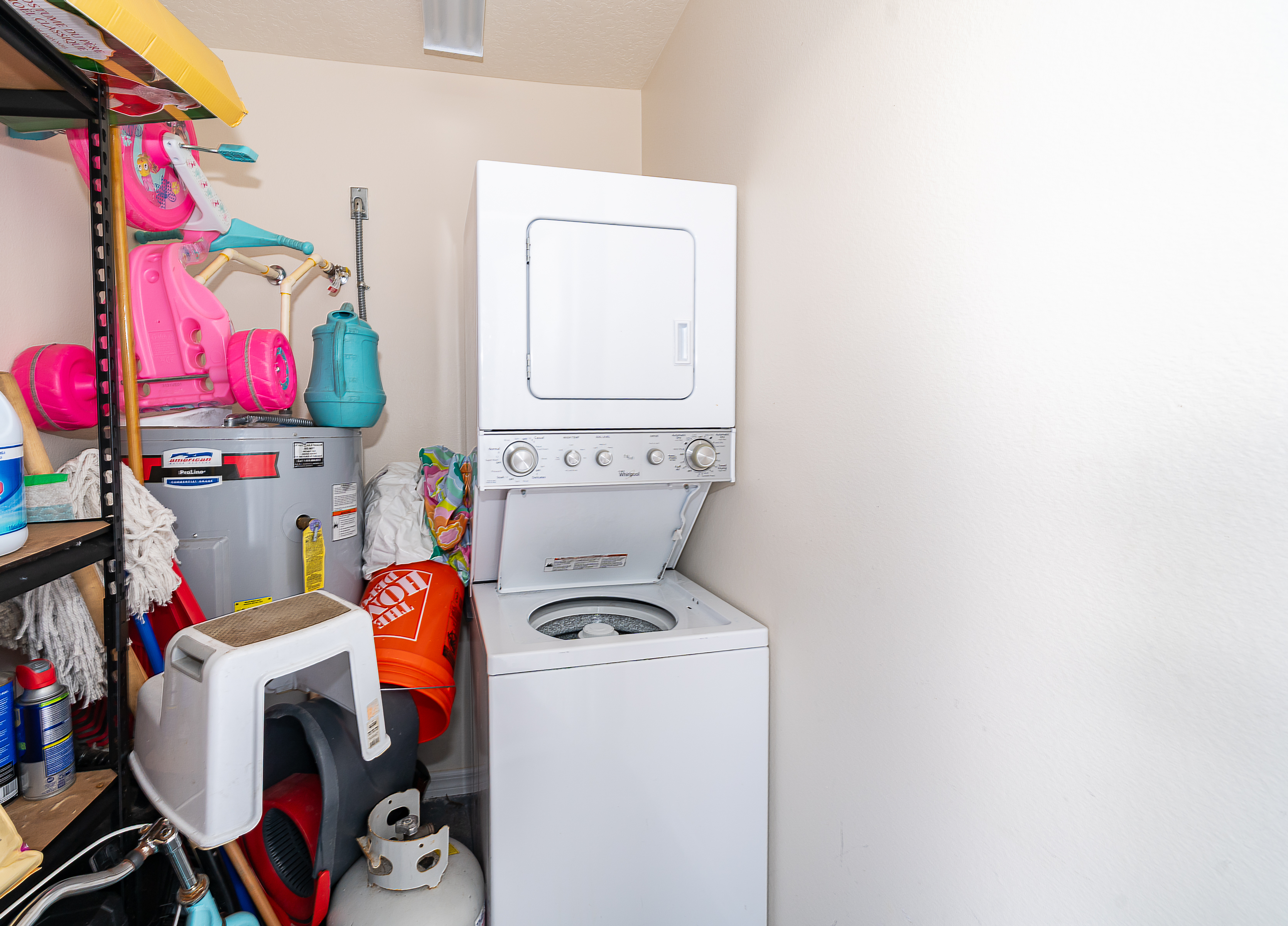 1360 Cottage Circle Tavares, FL 32778 - Photo 17 of 25 a view of storage and utility room with toys