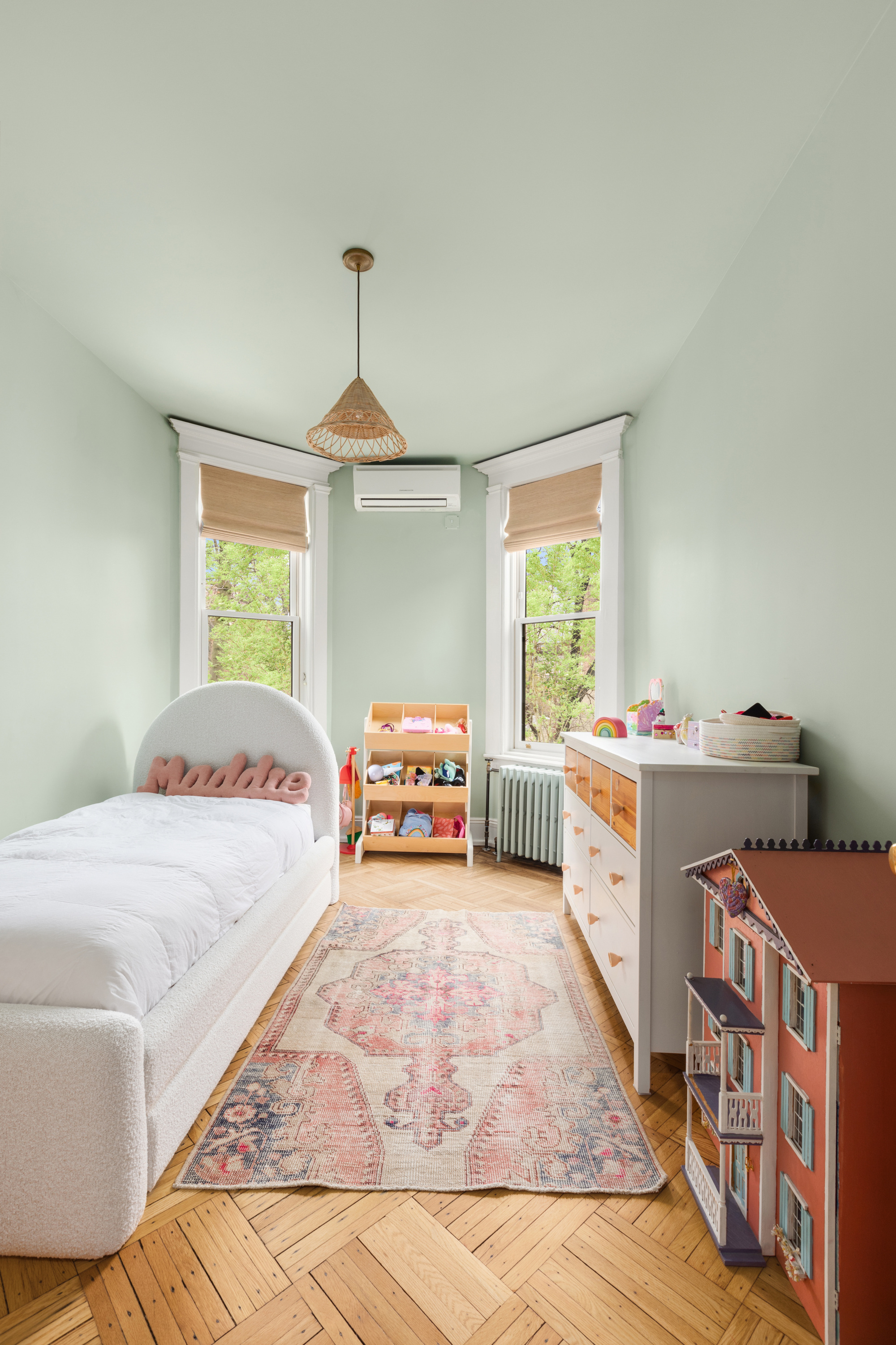 152 Underhill Avenue Brooklyn, NY 11238 - Photo 17 of 20 a bed room with a bed and a window