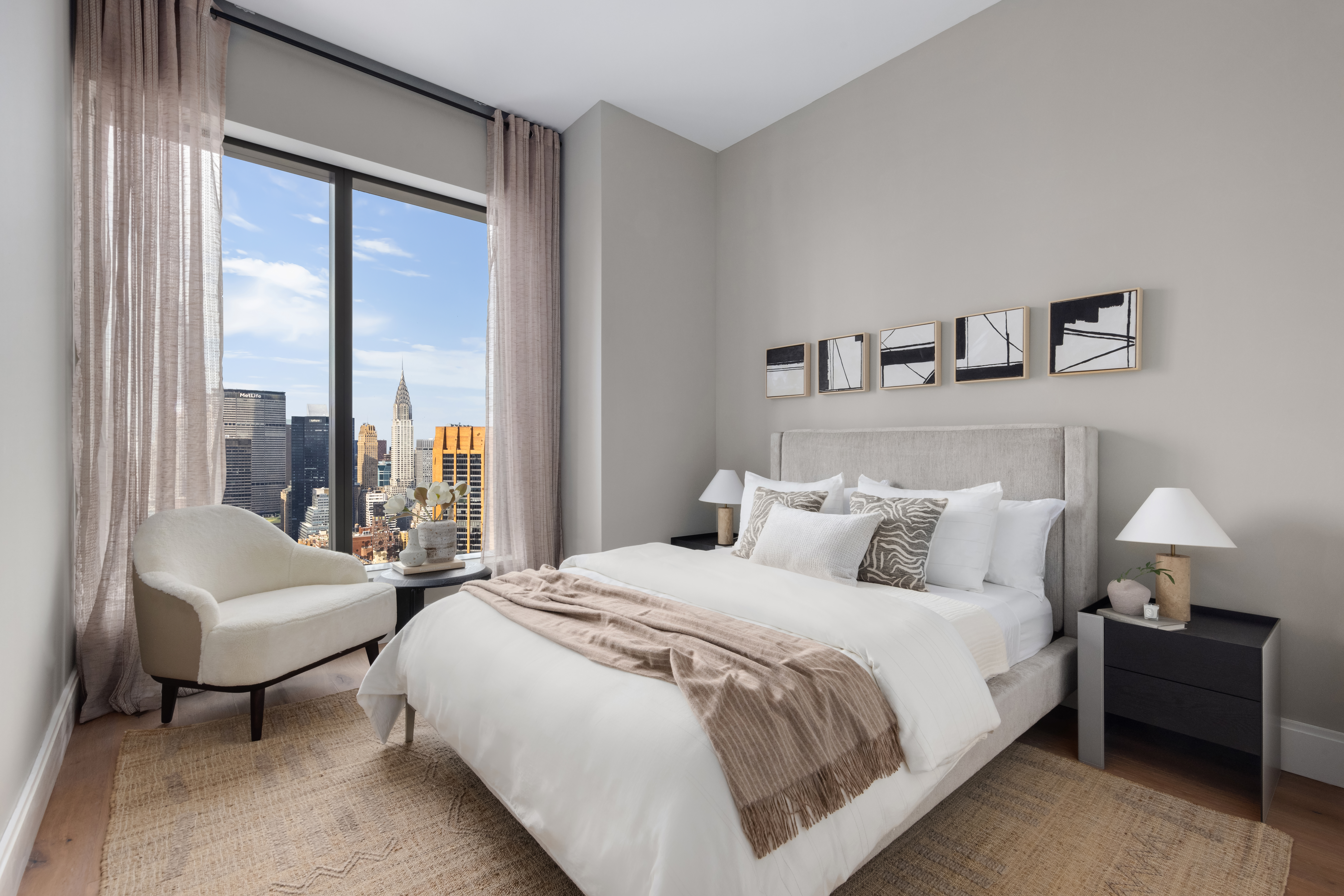 30 East 29th Street, Unit PHB Manhattan, NY 10016 - Photo 5 of 19 a large bed sitting in a bedroom next to a window