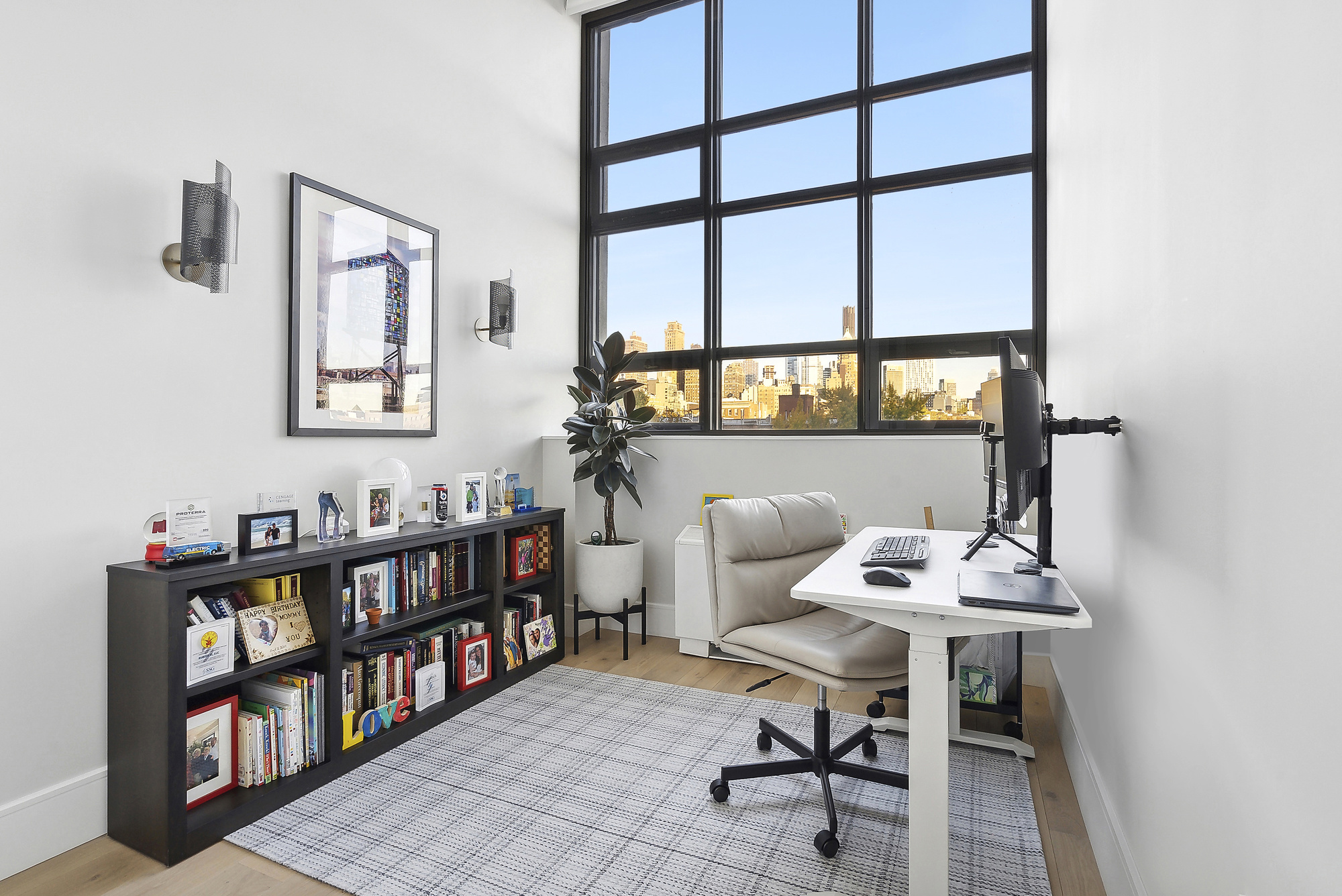 360 Furman Street, Unit 507/508 Brooklyn, NY 11201 - Photo 11 of 43 a workspace with furniture and a book shelf