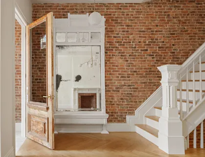a view of entryway with a front door