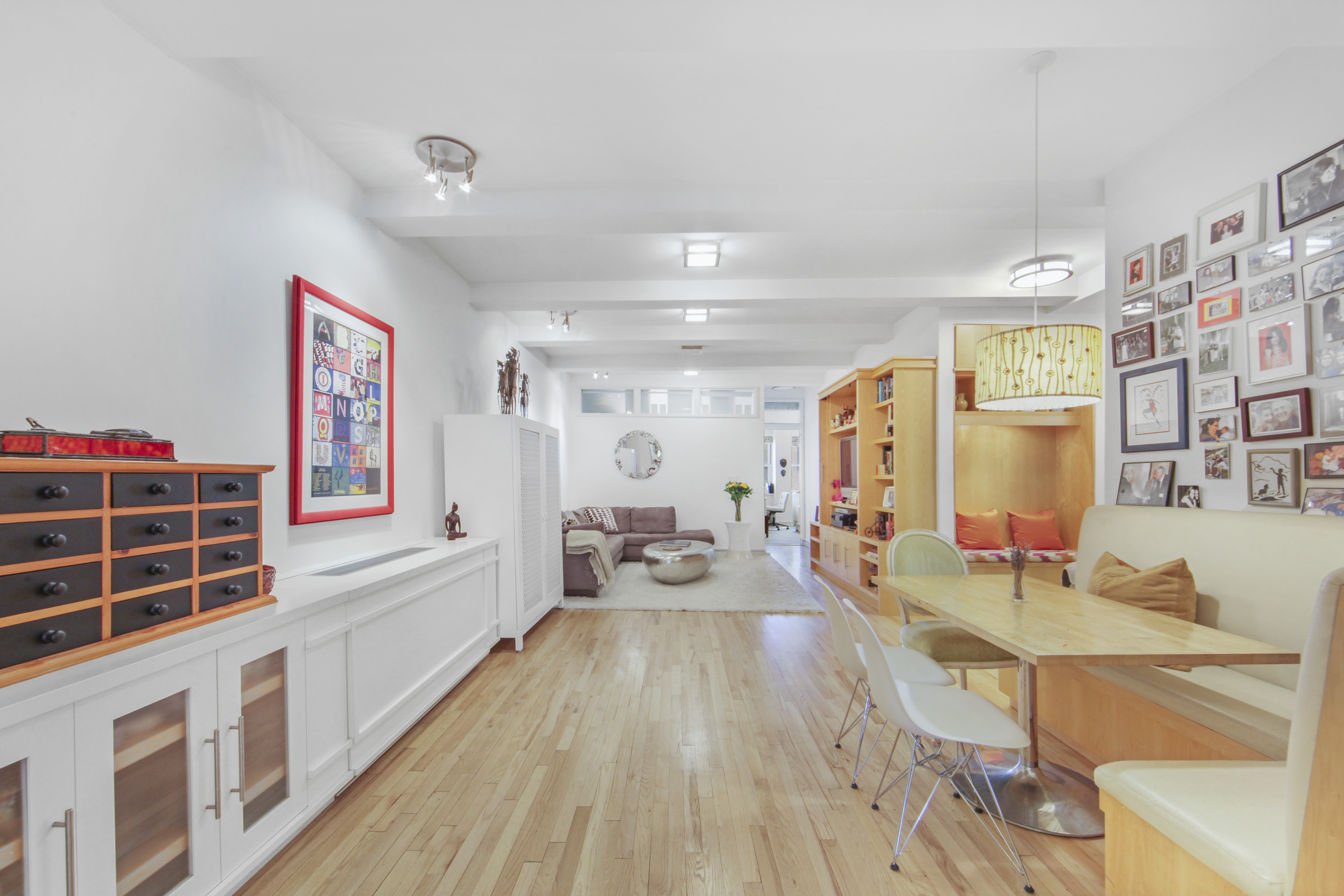 18 East 12th Street, Unit 7BC Manhattan, NY 10003 - Photo 13 of 26 a living room with furniture and a large window