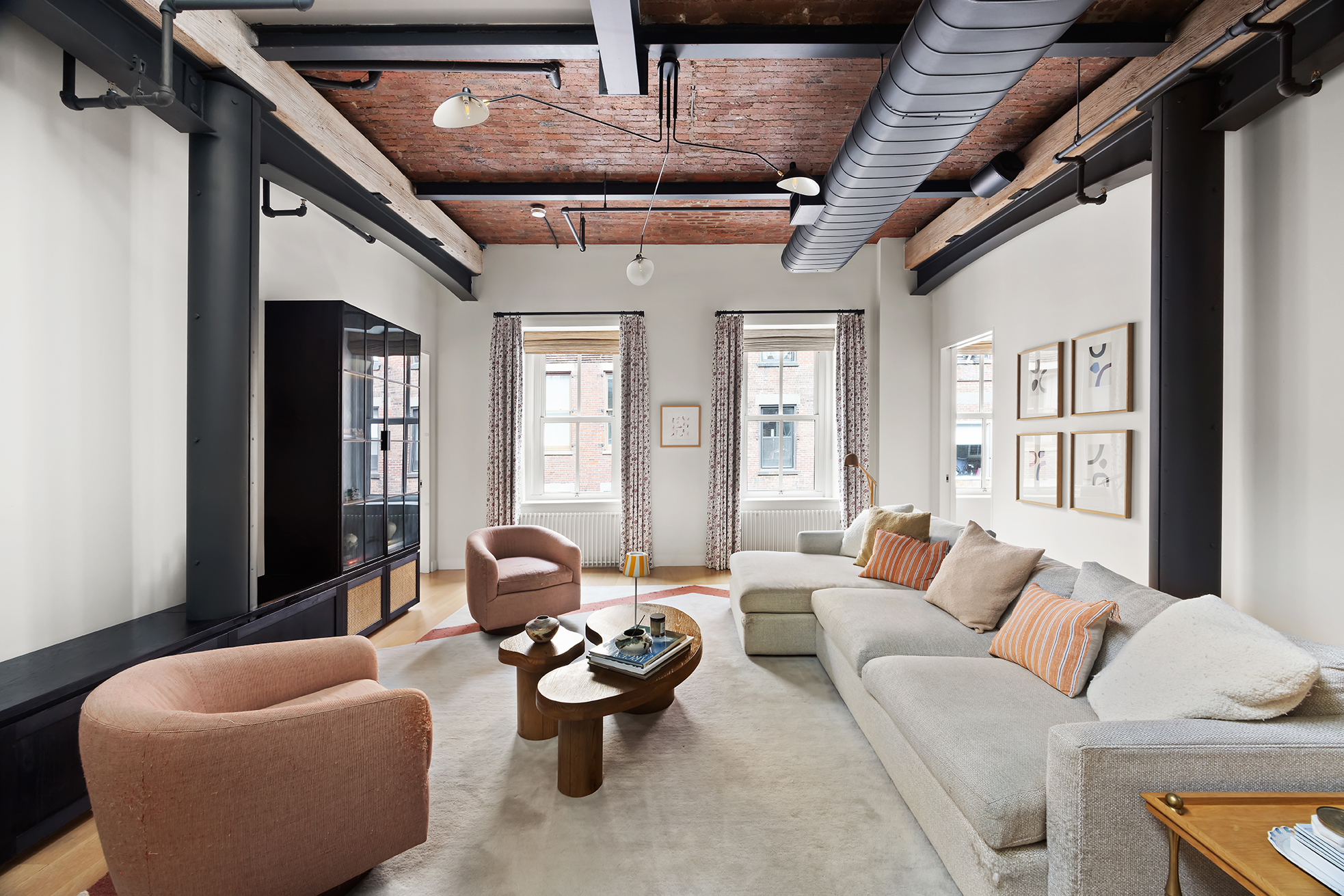 63 Greene Street, Unit PHB Manhattan, NY 10012 - Photo 6 of 17 a living room with furniture