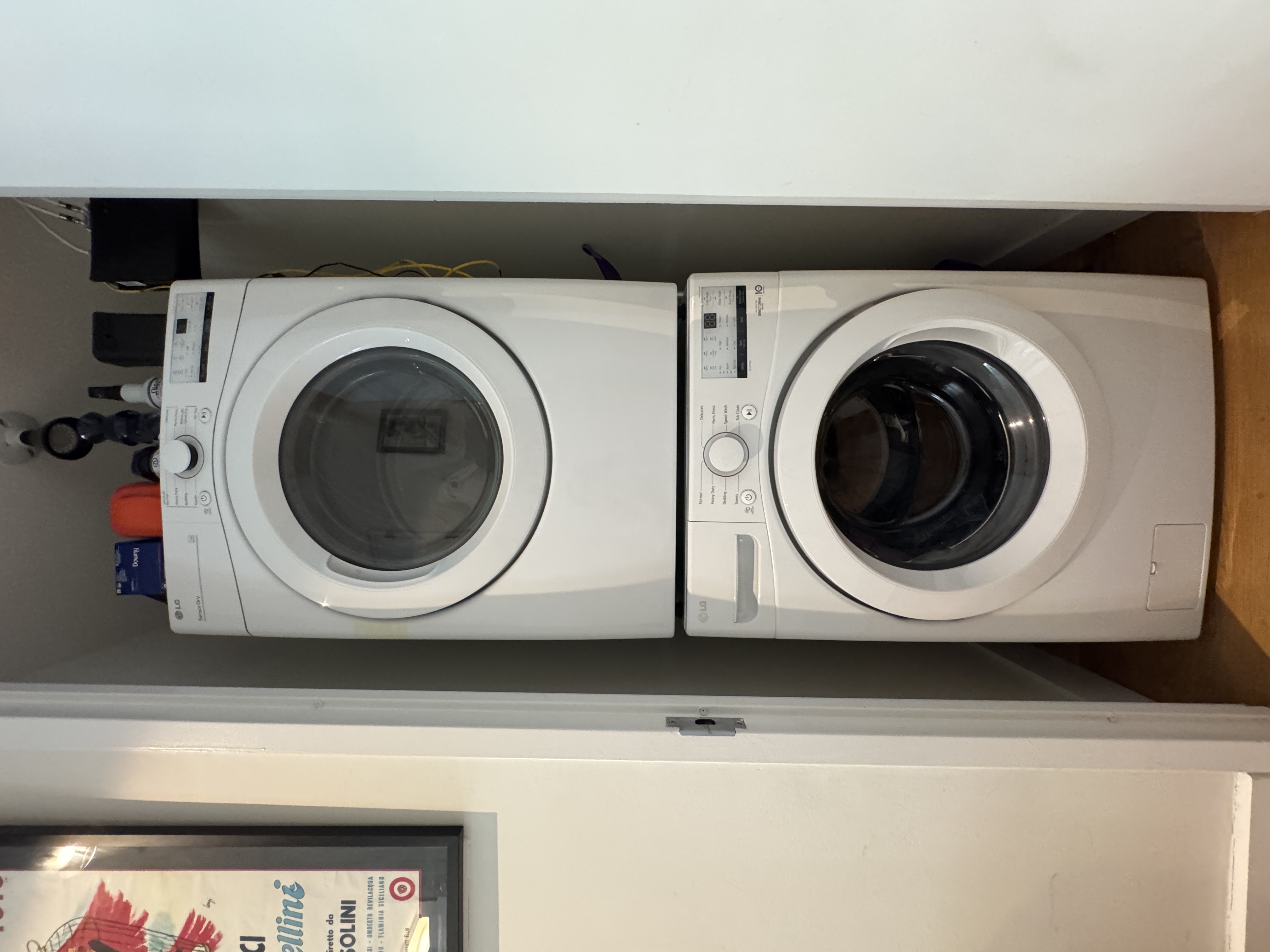 343 West 16th Street, Unit 3F Manhattan, NY 10011 - Photo 8 of 10 a utility room with dryer and washer
