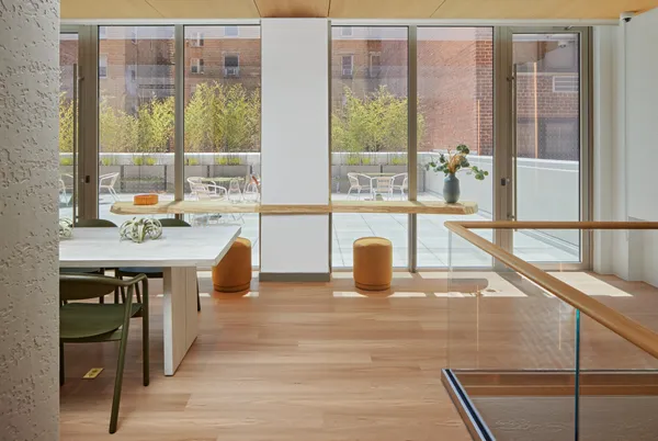 a view of a building with sitting area