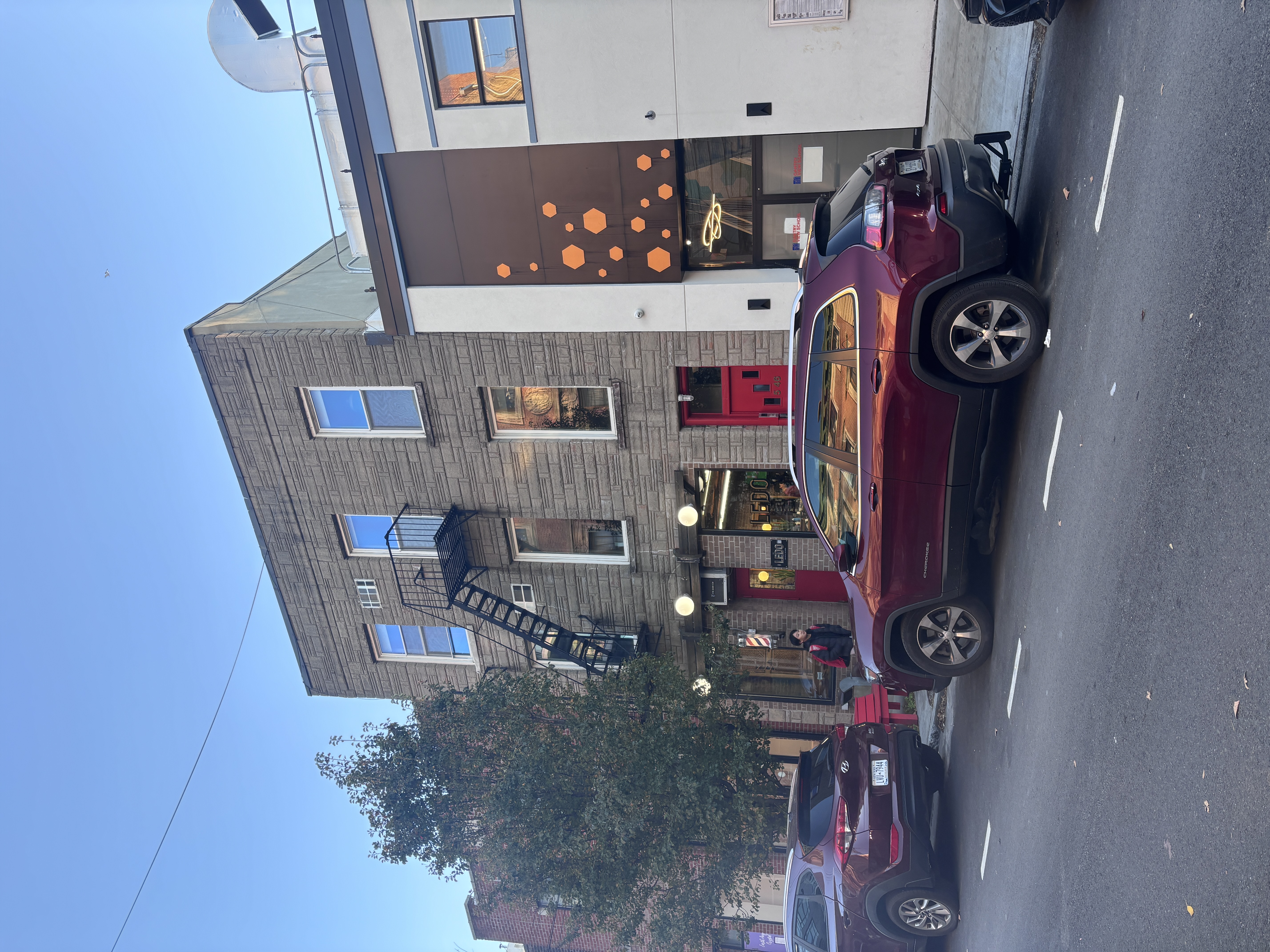 a car parked in front of a house