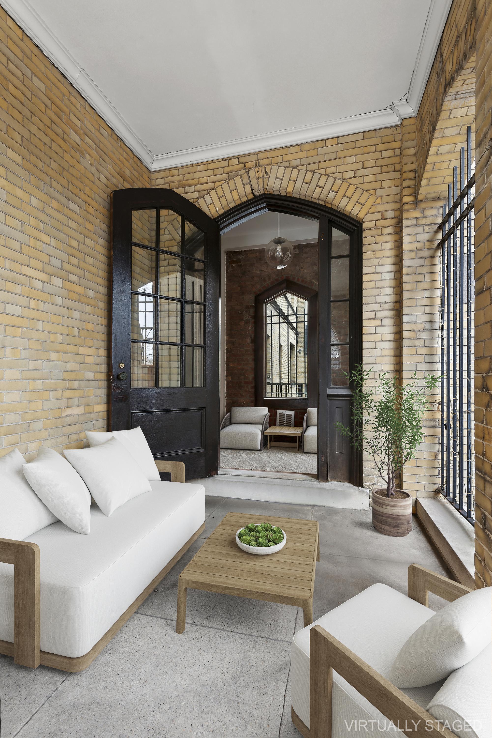 180 Bainbridge Street, Unit 112 Brooklyn, NY 11233 - Photo 6 of 30 a living room with furniture and a large window