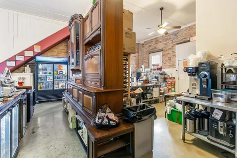 a view of a chairs in back yard of the house