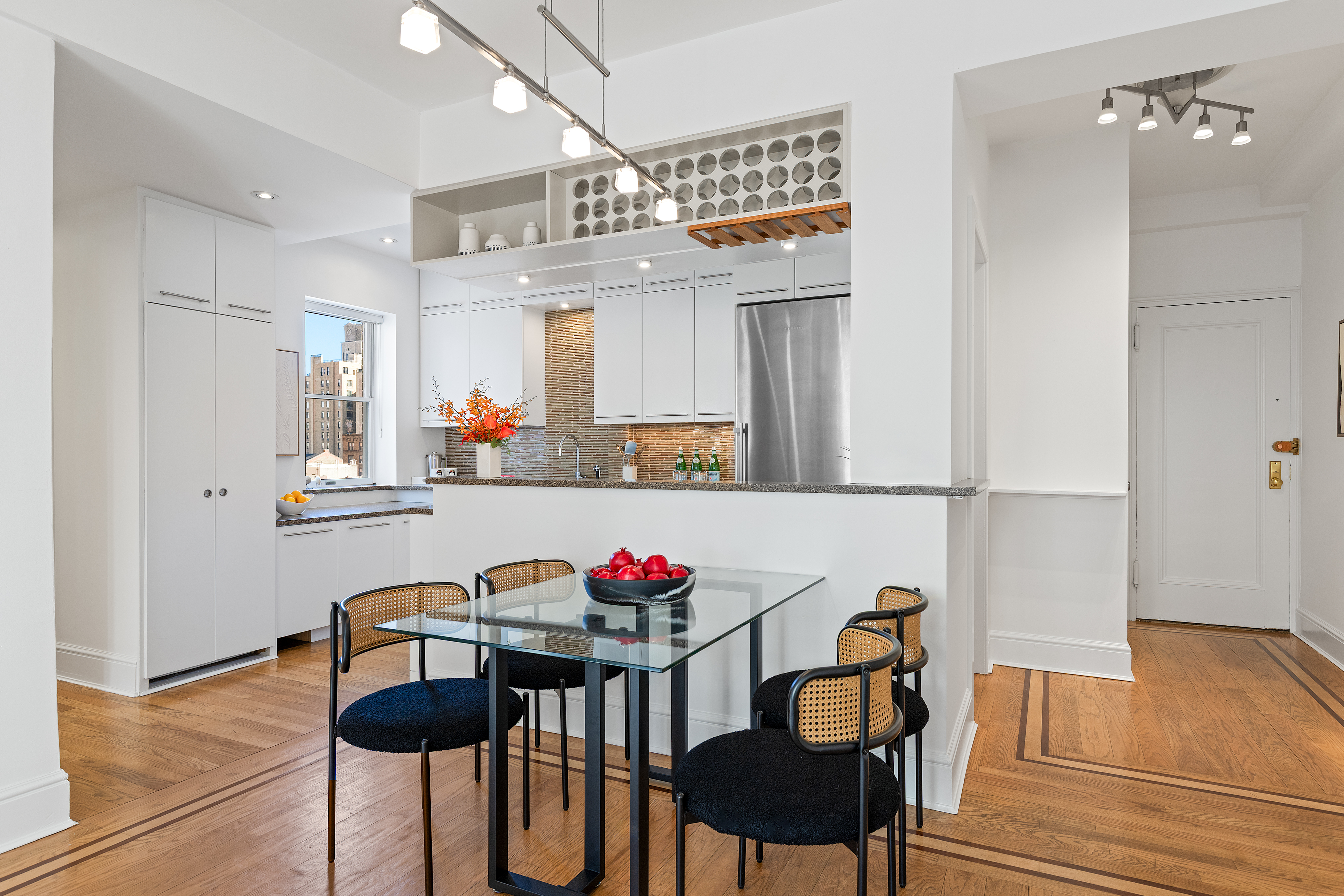 59 West 71st Street, Unit 9C Manhattan, NY 10023 - Photo 3 of 11 a view of a dining room with furniture and wooden floor
