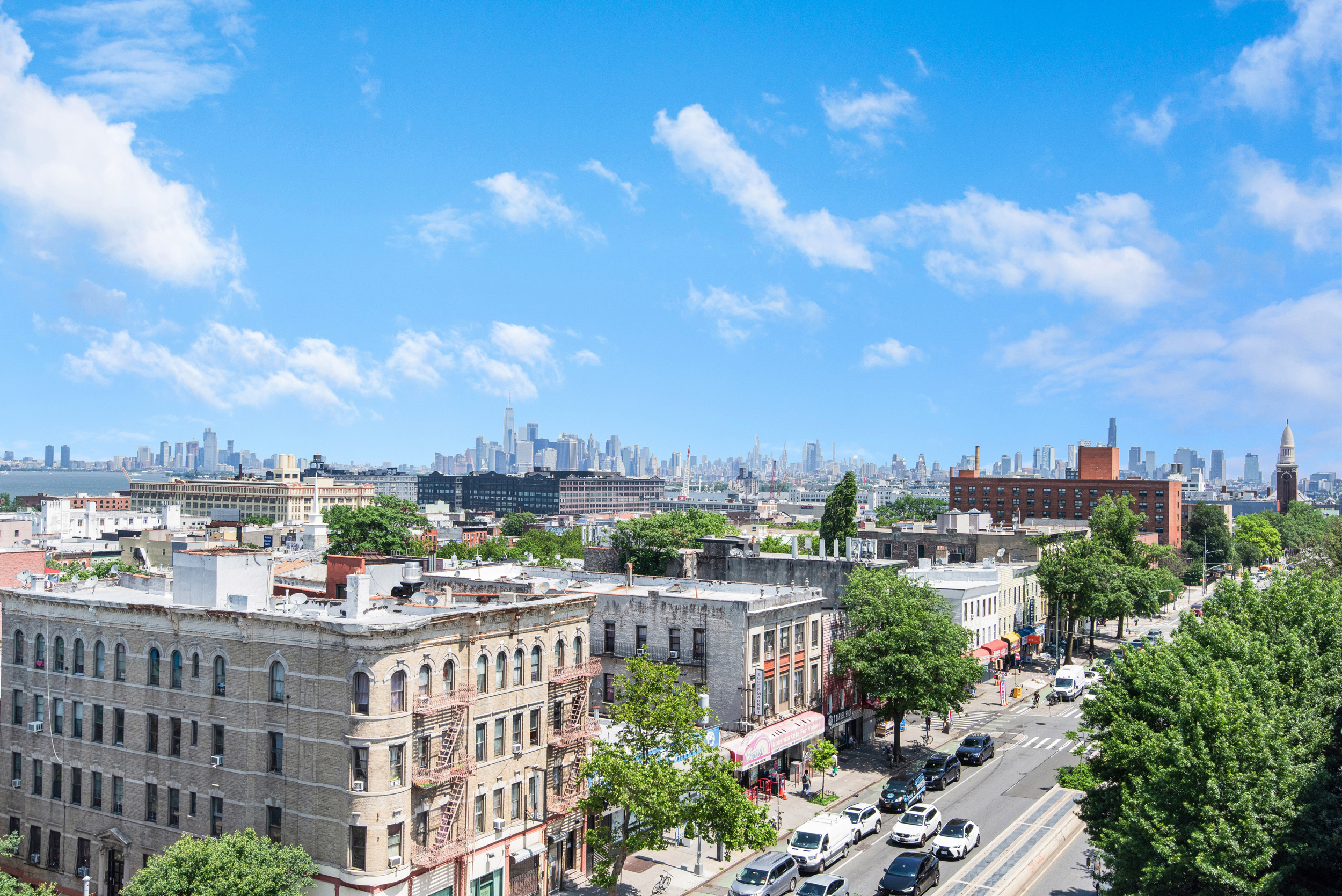 4907 4th Avenue, Unit 7A Brooklyn, NY 11220 - Photo 3 of 13 a view of a city with a tall buildings