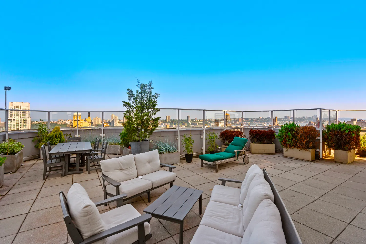 a view of a terrace with furniture
