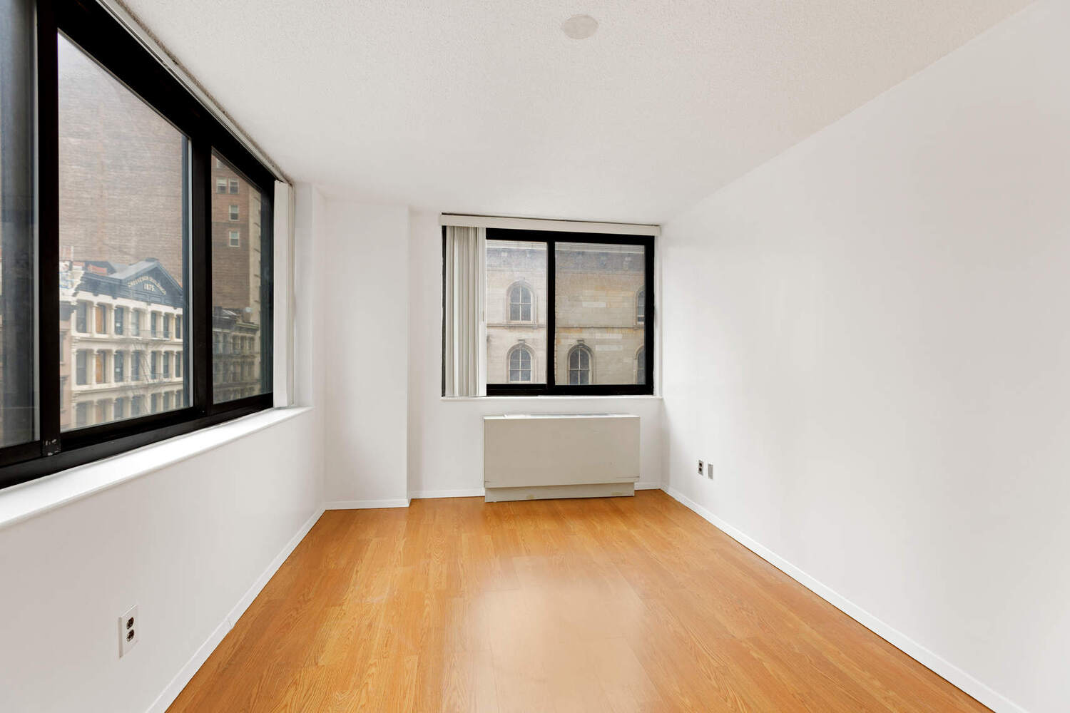 376 Broadway, Unit 6F Manhattan, NY 10013 - Photo 9 of 17 a view of an empty room