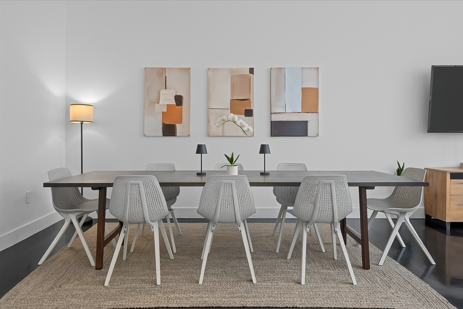 133 West 14th Street, Unit 1 Manhattan, NY 10011 - Photo 4 of 17 a view of a dining room with furniture and wooden floor