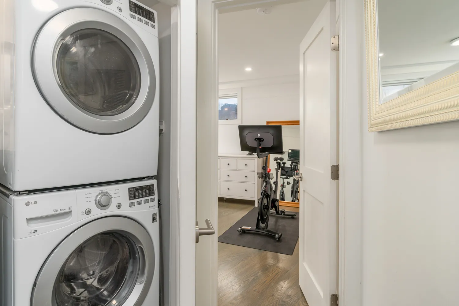 a view of a storage and utility room with a washer and dryer