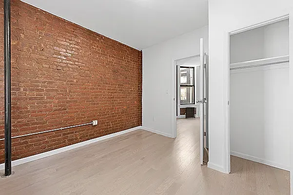 117 Mulberry Street, Unit 9 Manhattan, NY 10013 - Photo 4 of 5 a view of an empty room