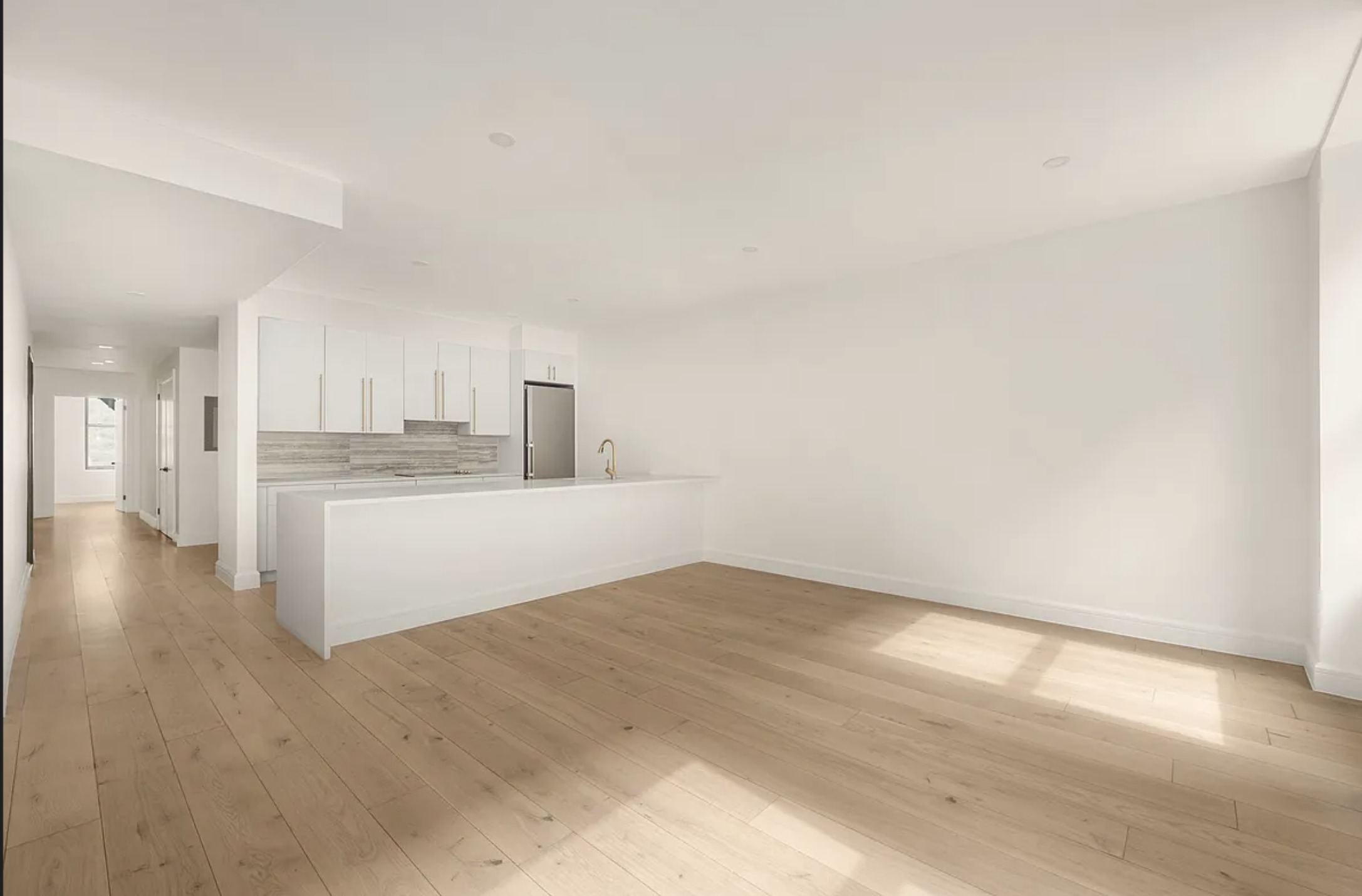 17 West 24th Street, Unit 4 Manhattan, NY 10010 - Photo 4 of 8 a view of kitchen with wooden floor