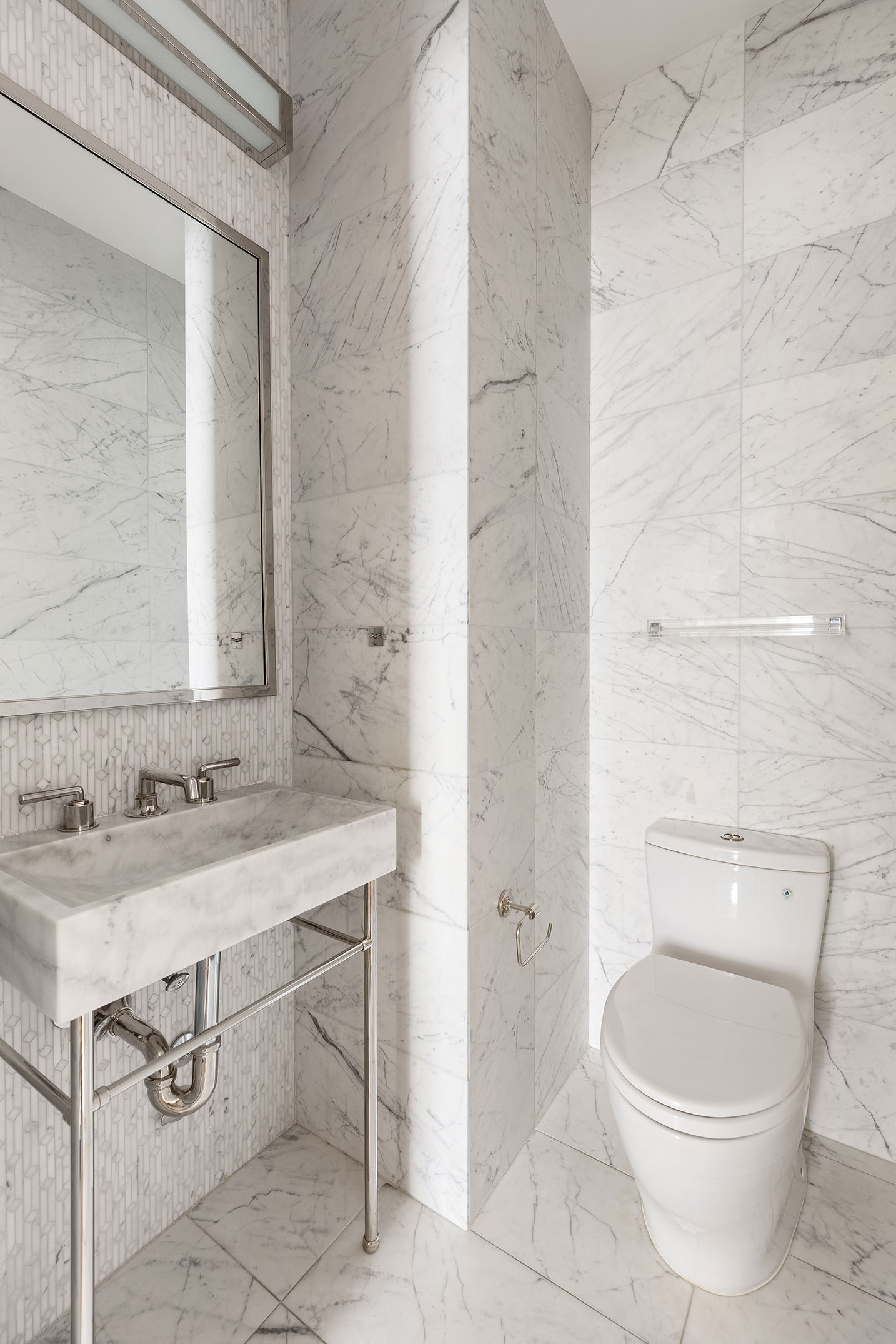 116 University Place, Unit 5 Manhattan, NY 10003 - Photo 17 of 19 a bathroom with a sink toilet and mirror