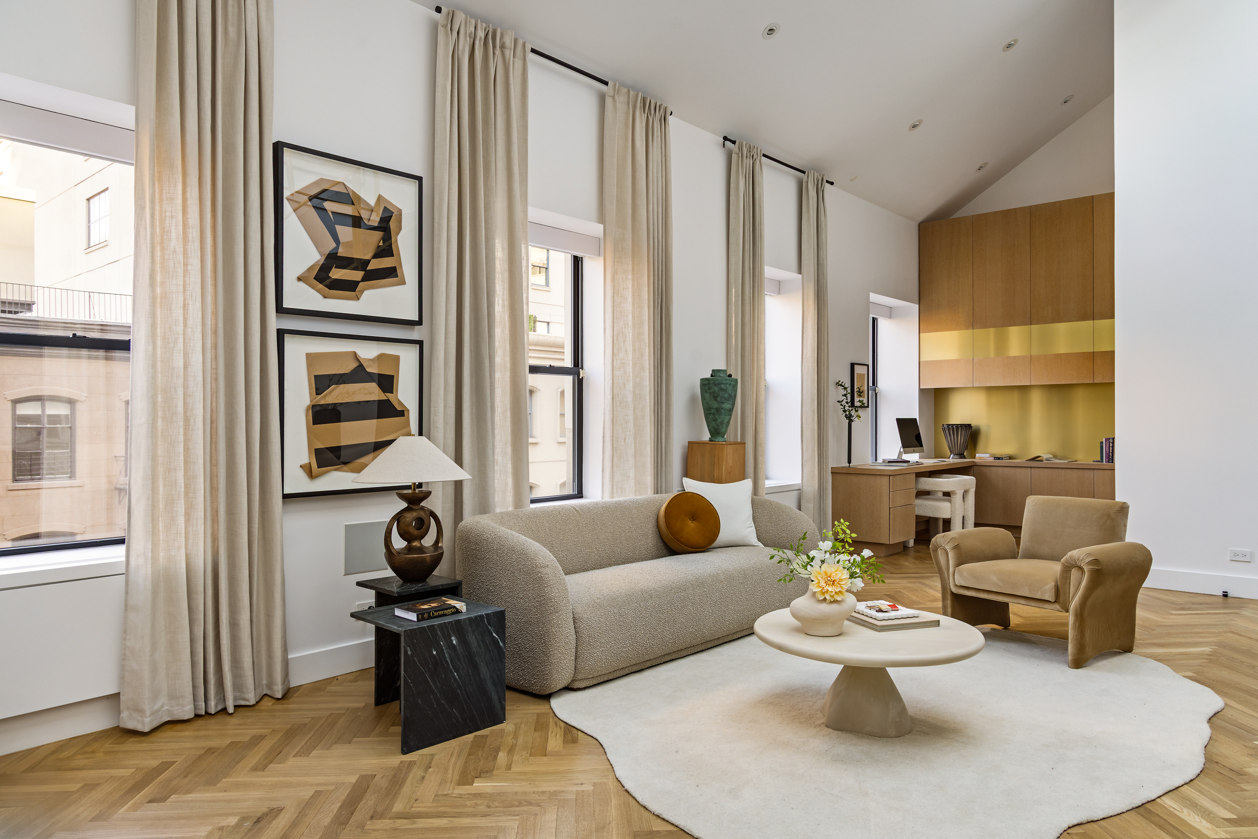 45 Warren Street, Unit PH Manhattan, NY 10007 - Photo 26 of 29 a living room with furniture and a large window