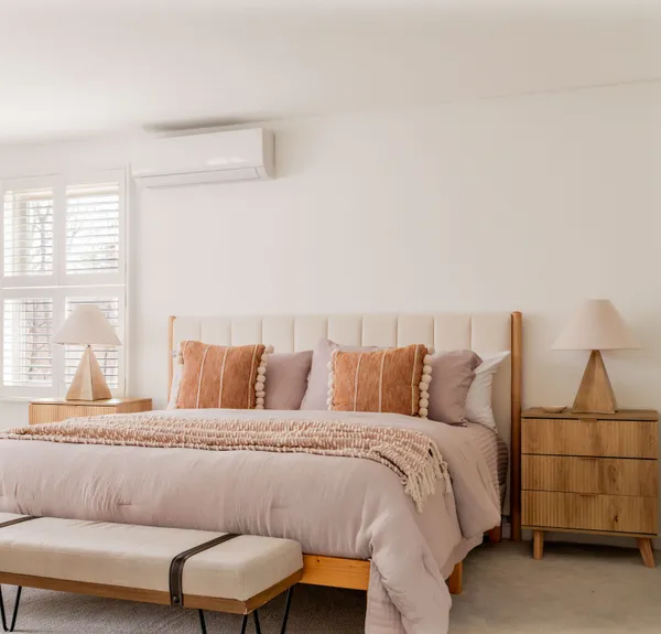 a bed room with a bed and a couch