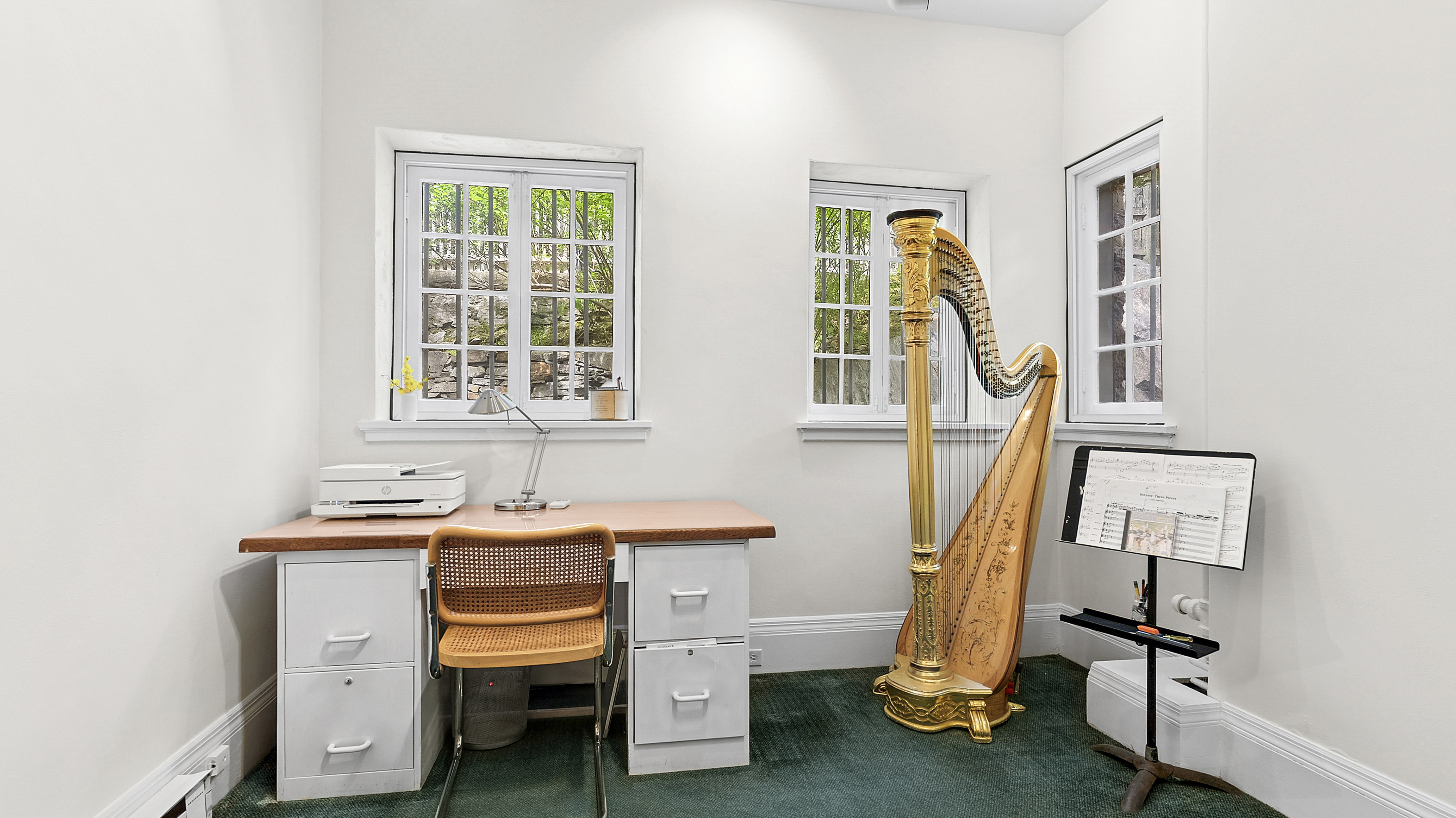 4417 Tibbett Avenue Bronx, NY 10471 - Photo 8 of 20 a bedroom with a bed and a window