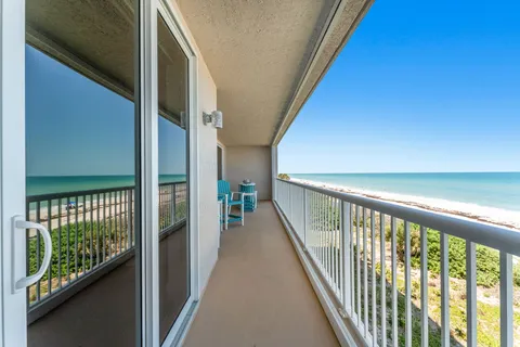 a view of an ocean from a balcony