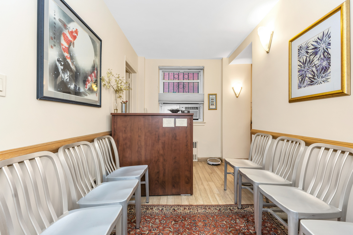 936 5th Avenue, Unit 2 Manhattan, NY 10021 - Photo 6 of 6 a view of a hallway with furniture and workspace