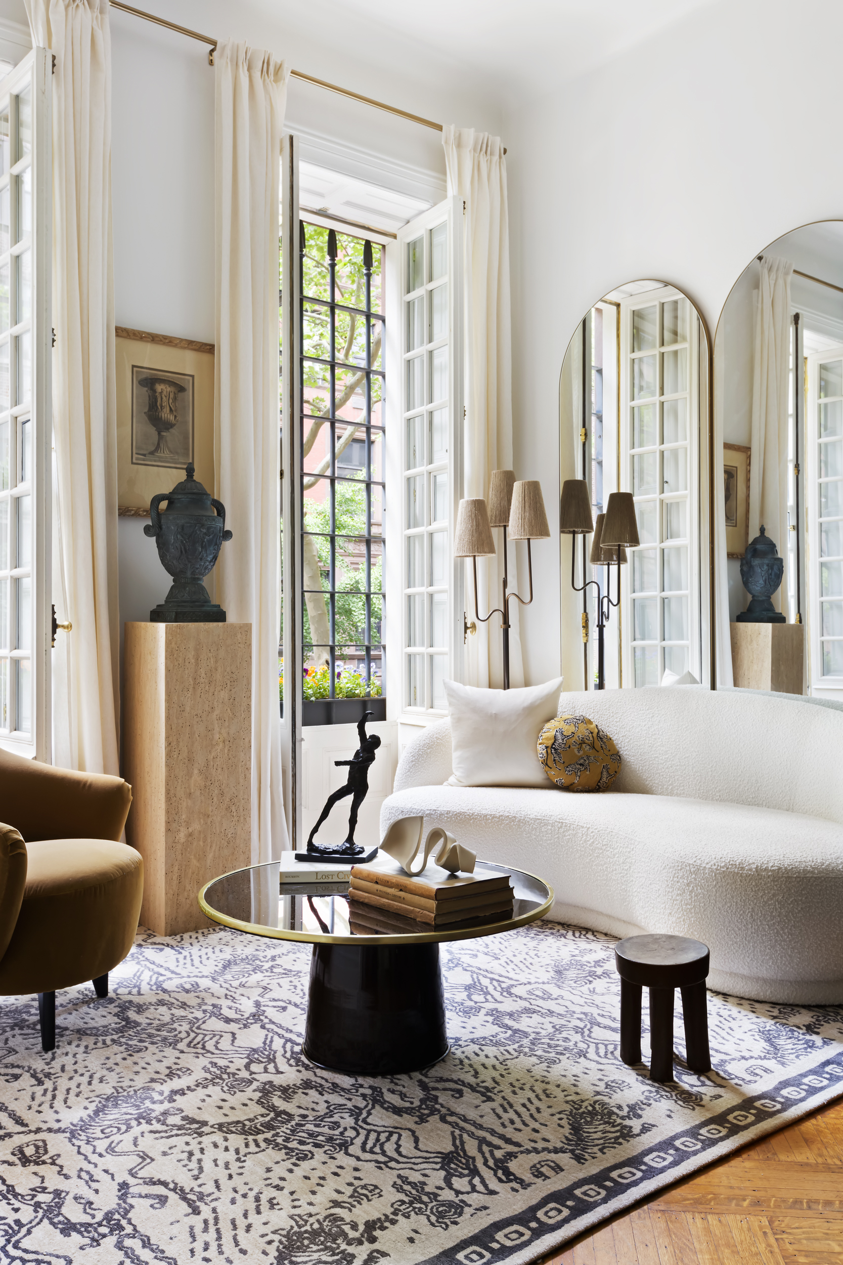 37 West 70th Street Manhattan, NY 10023 - Photo 7 of 41 a living room with furniture water view and large windows