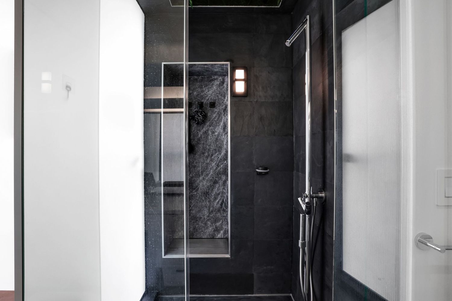 1630 19th Street Northwest, Unit C Washington, DC 20009 - Photo 24 of 45 a bathroom with a glass shower door and a sink