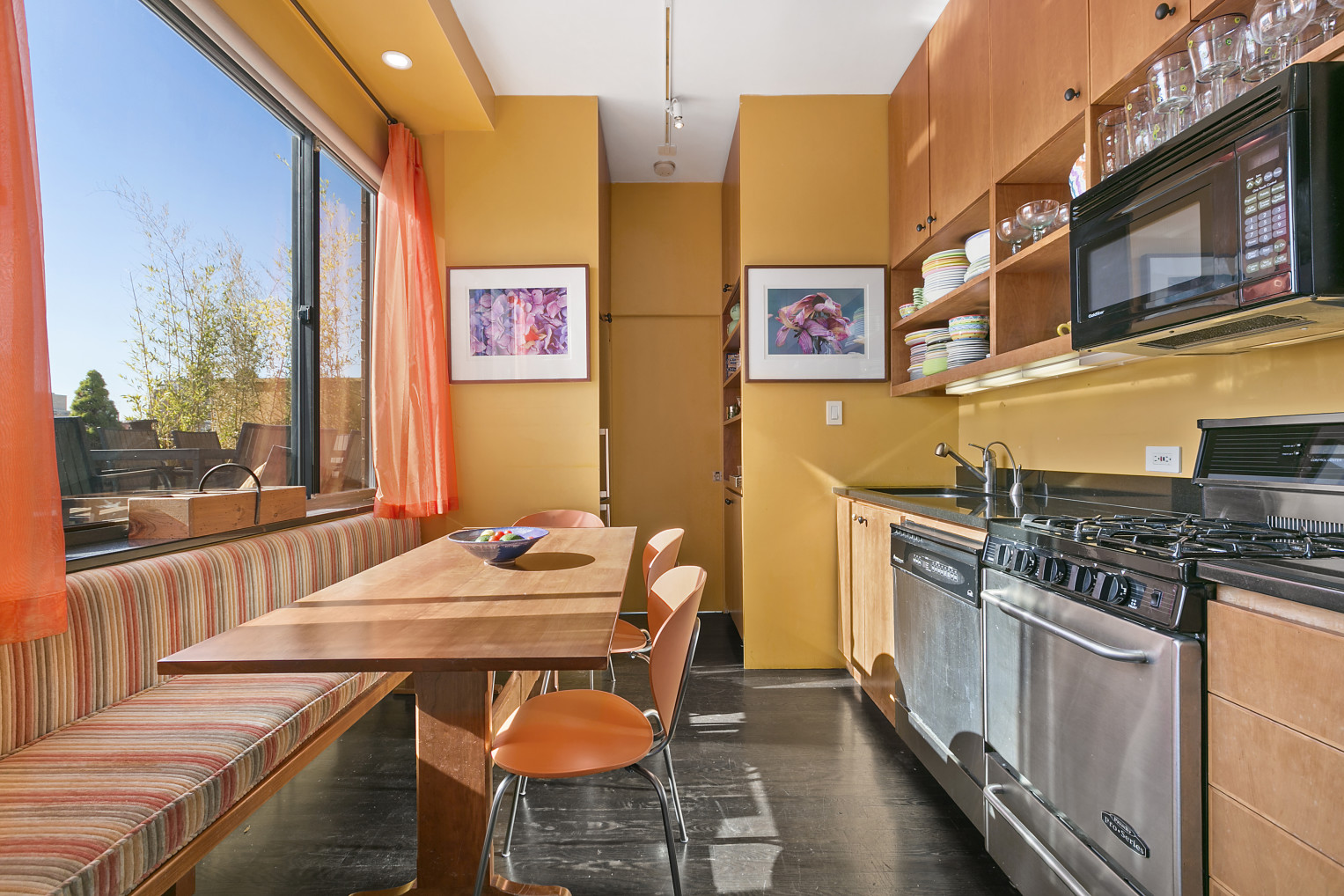 130 West 79th Street, Unit 17A Manhattan, NY 10024 - Photo 5 of 15 a balcony filled with a table and chairs