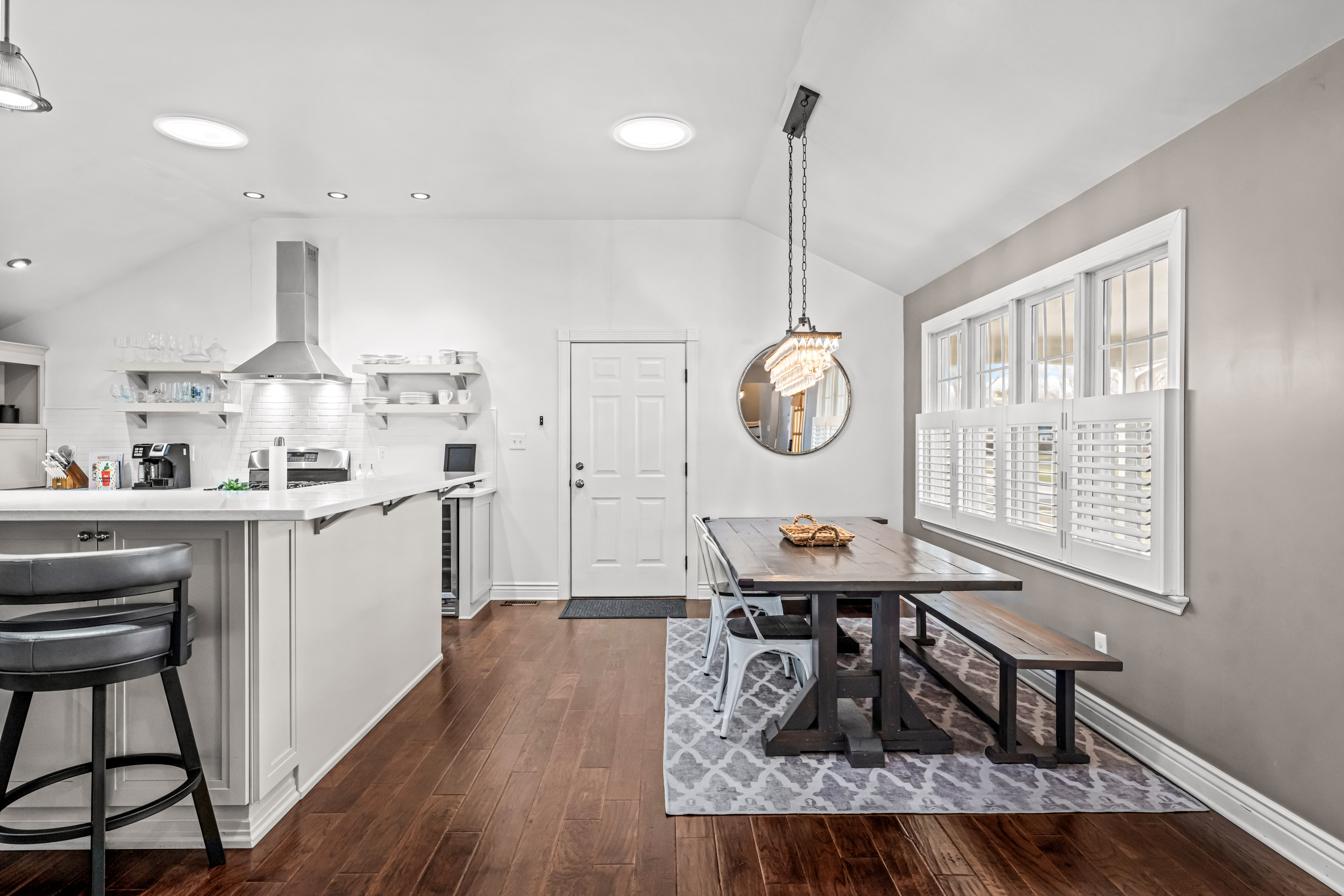 430 Pelham Road Cherry Hill, NJ 08034 - Photo 7 of 48 a dining room with wooden floor a chandelier a wooden table and chairs