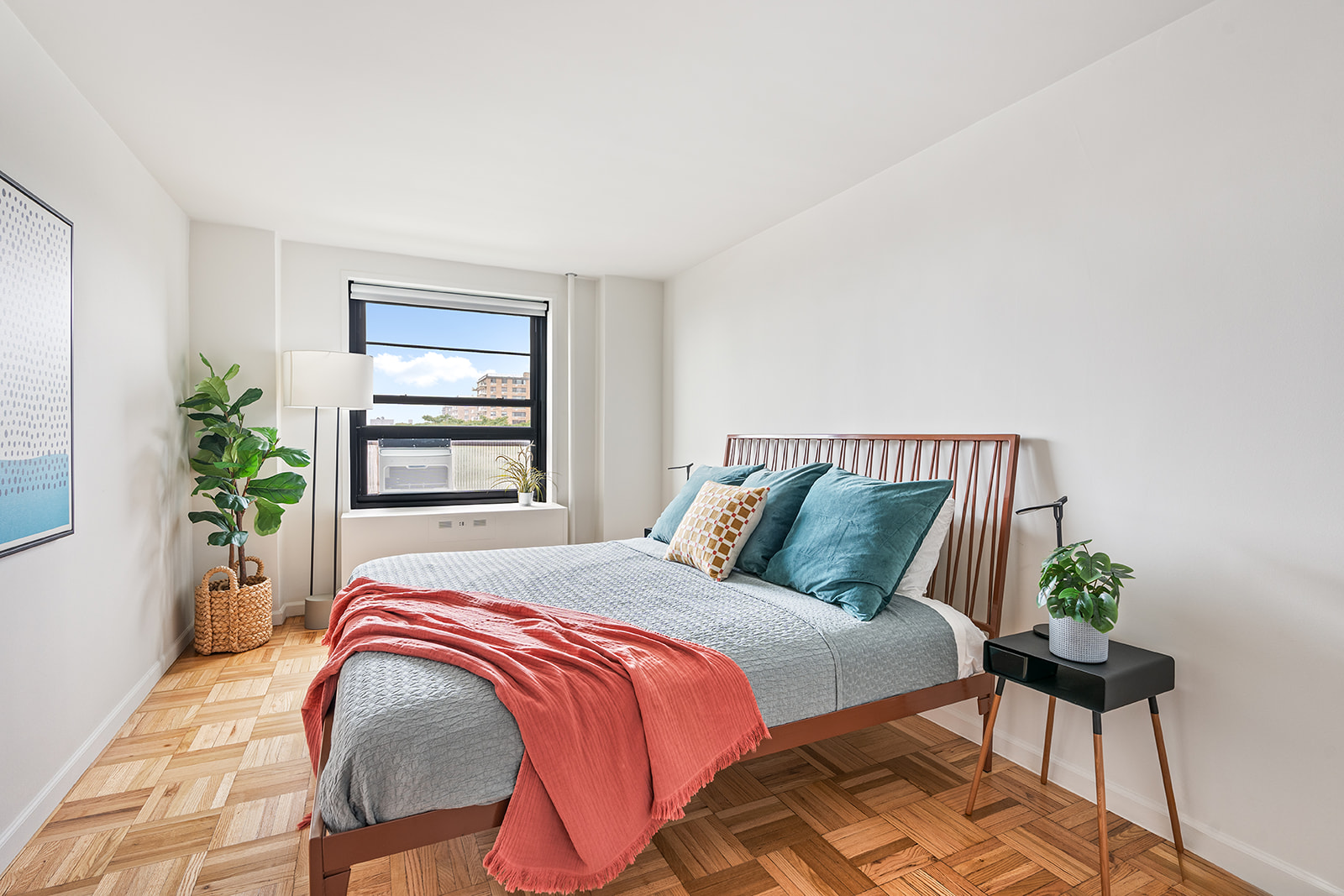 193 Clinton Avenue, Unit 9D Brooklyn, NY 11205 - Photo 3 of 11 a bedroom with a bed and a potted plant