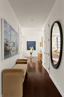 a view of living room with furniture and a large window