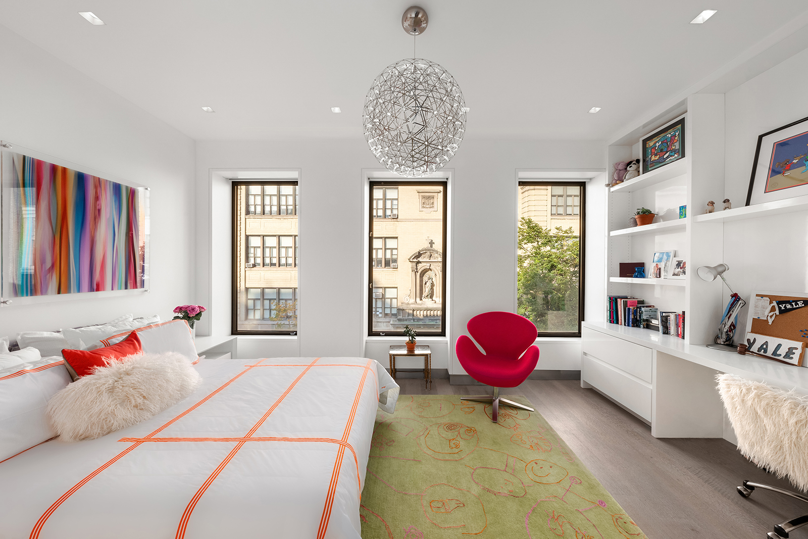 184 East 75th Street Manhattan, NY 10021 - Photo 13 of 20 a bedroom with a bed and window