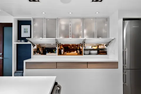 a kitchen with stainless steel appliances granite countertop a stove and a sink