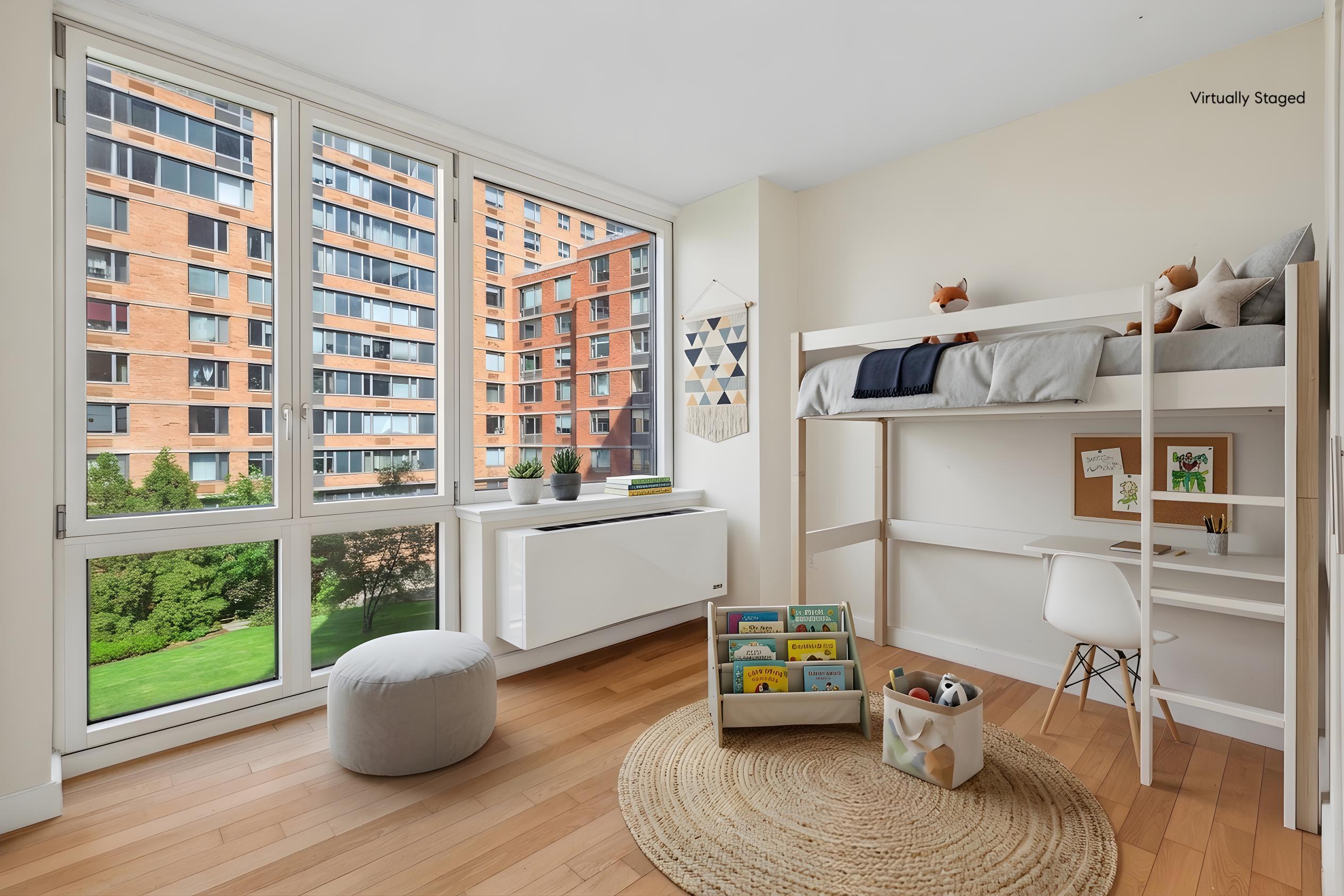 415 Main Street, Unit 4G Manhattan, NY 10044 - Photo 13 of 23 a living room with furniture and a wooden floor