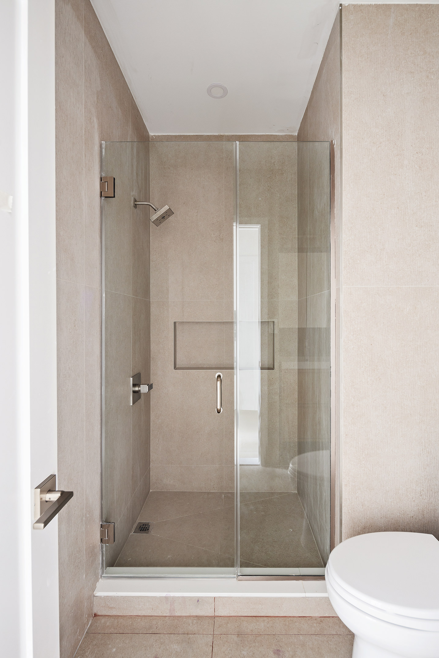 392 5th Avenue, Unit 3A Brooklyn, NY 11215 - Photo 6 of 9 a bathroom with a shower and toilet