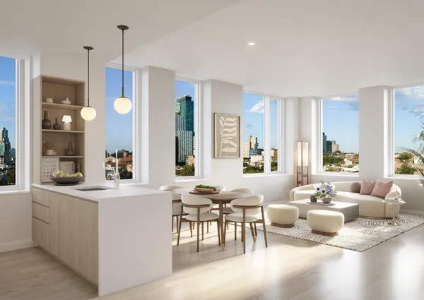 a living room with furniture a fireplace a flat screen tv and a large window