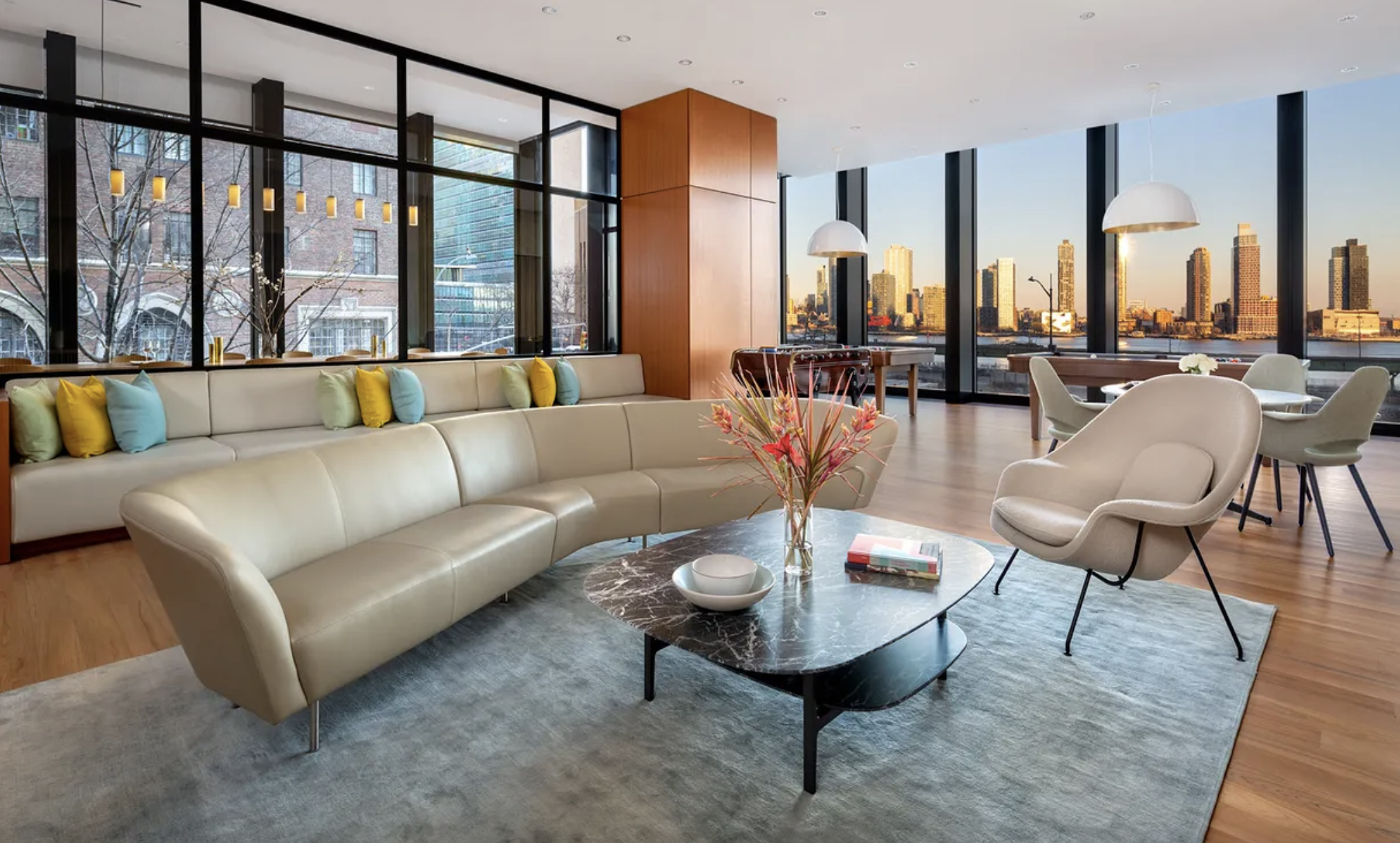 695 1st Avenue, Unit 31C Manhattan, NY 10016 - Photo 18 of 27 a living room with furniture and a large window