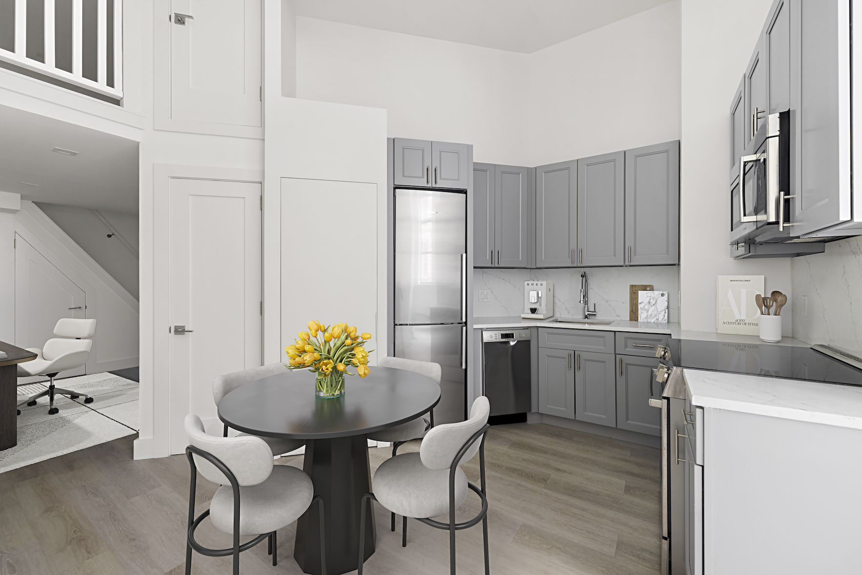 74 Leonard Street, Unit 2D Manhattan, NY 10013 - Photo 4 of 8 a kitchen with refrigerator and cabinets