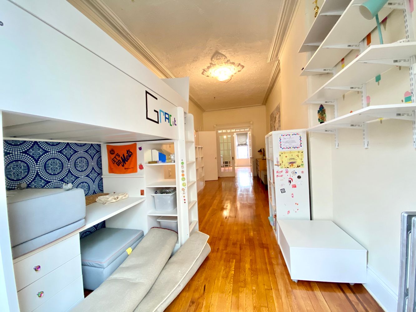 390 5th Street, Unit 1 Brooklyn, NY 11215 - Photo 5 of 15 a hallway with a couch and a couch