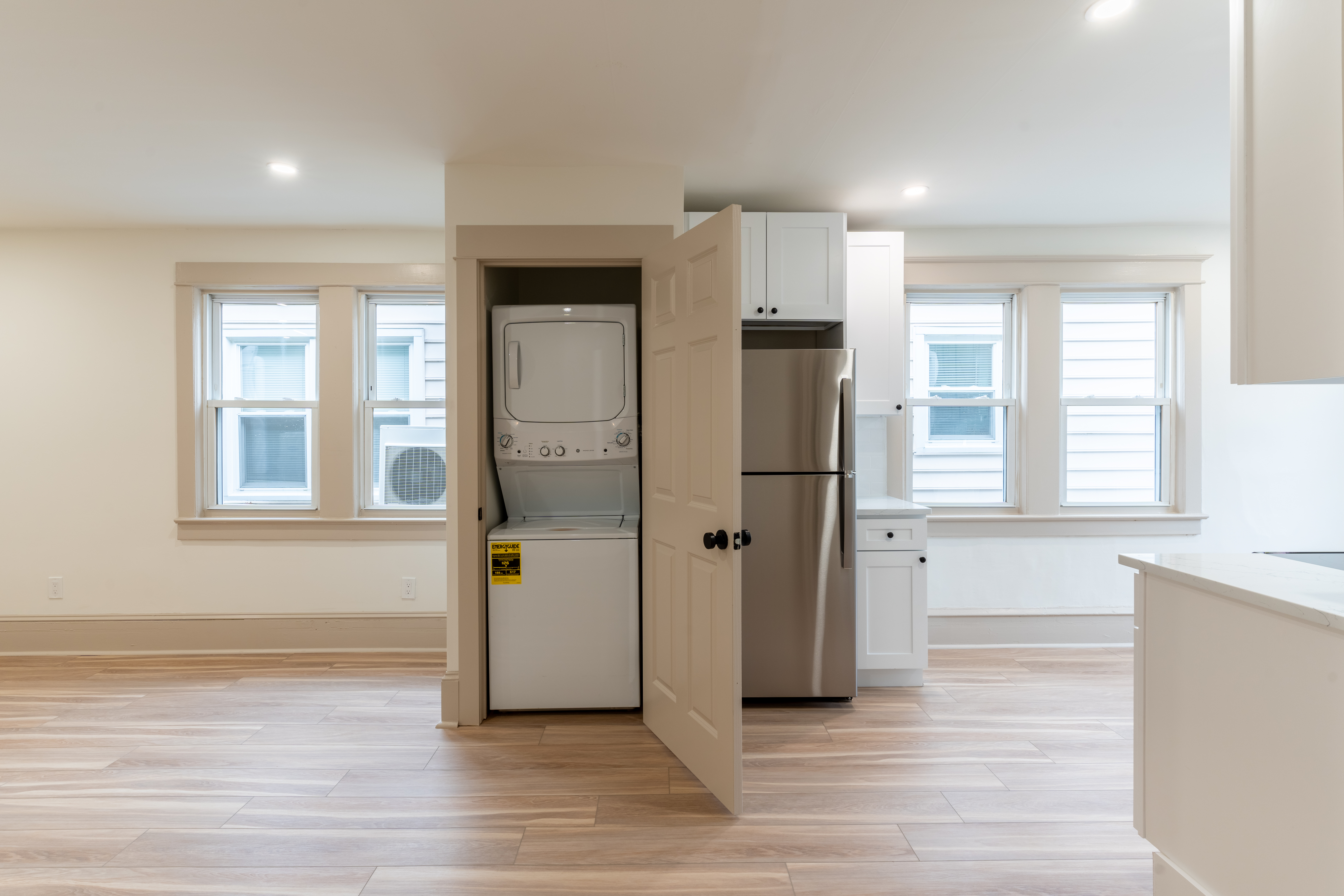 423 North Haddon Avenue Haddonfield, NJ 08033 - Photo 7 of 16 an empty room with wooden floor and windows